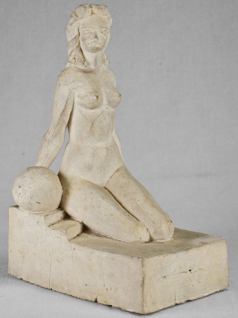 1940's plaster sculpture of a lady and a ball 12¼"