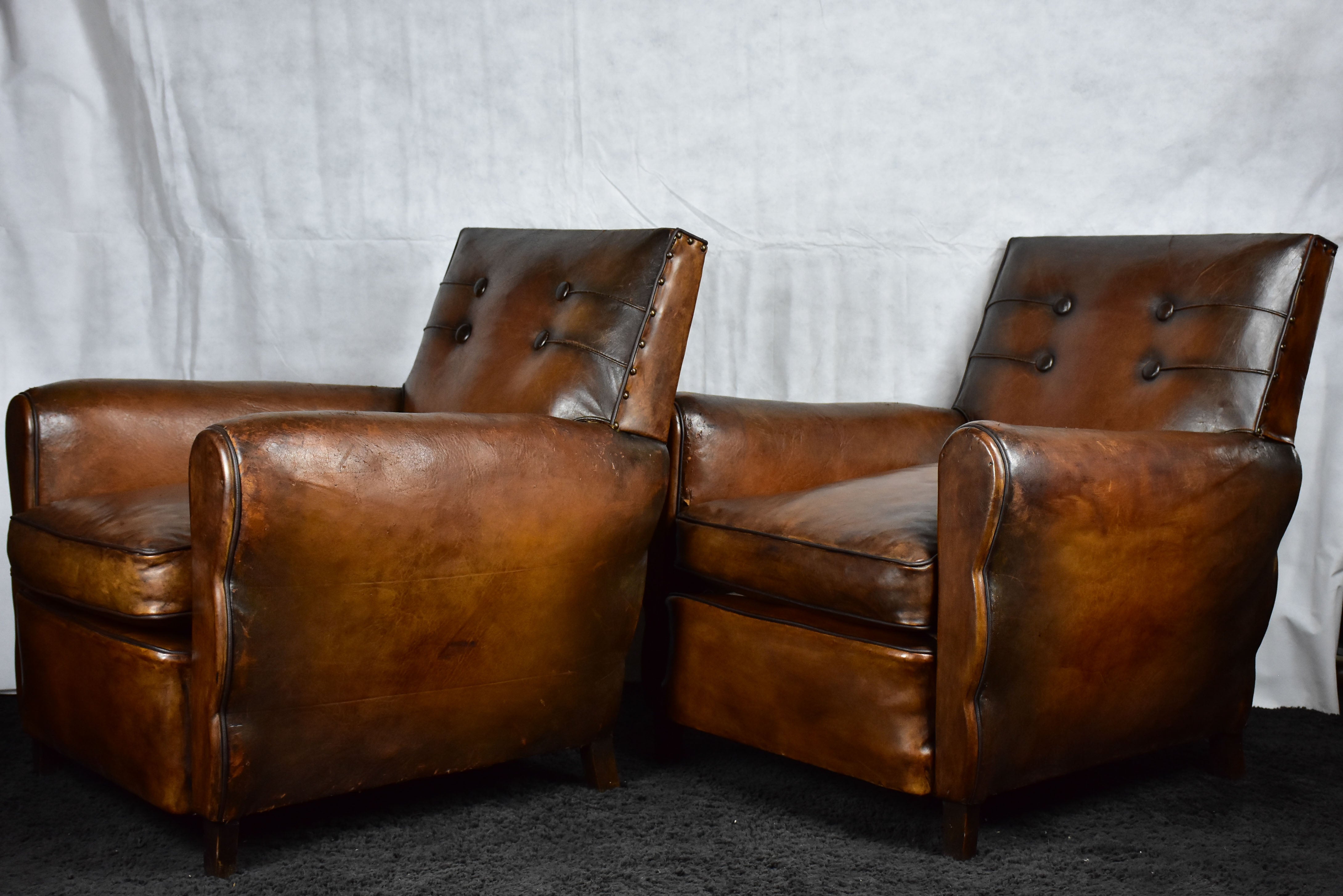 Pair of 1950's French leather club chairs