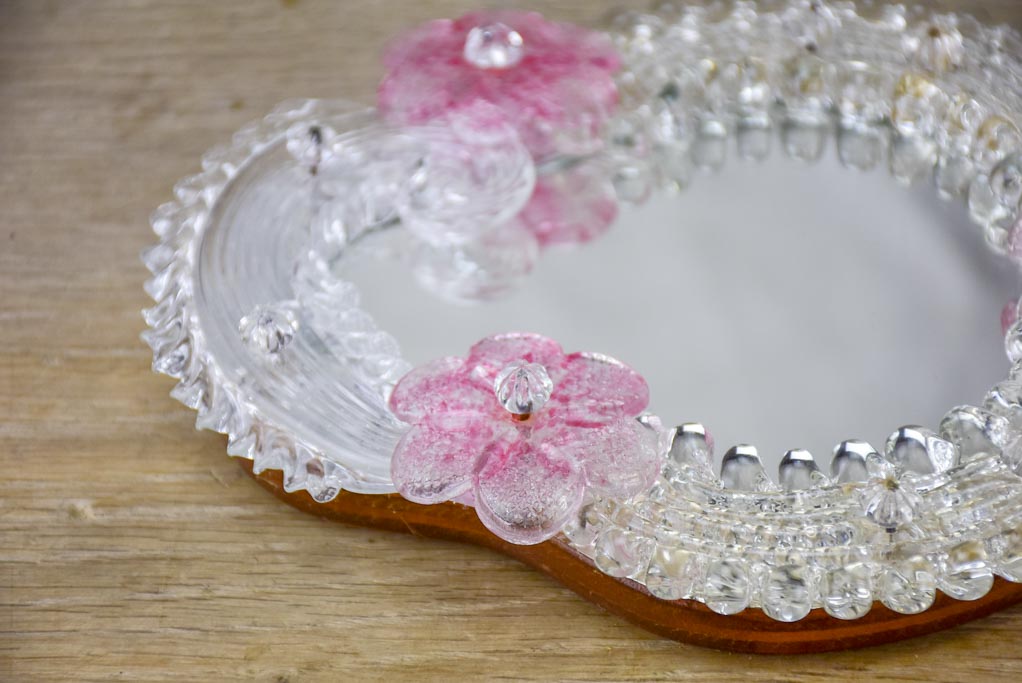 Vintage Venetian-style hand mirror with pink flowers