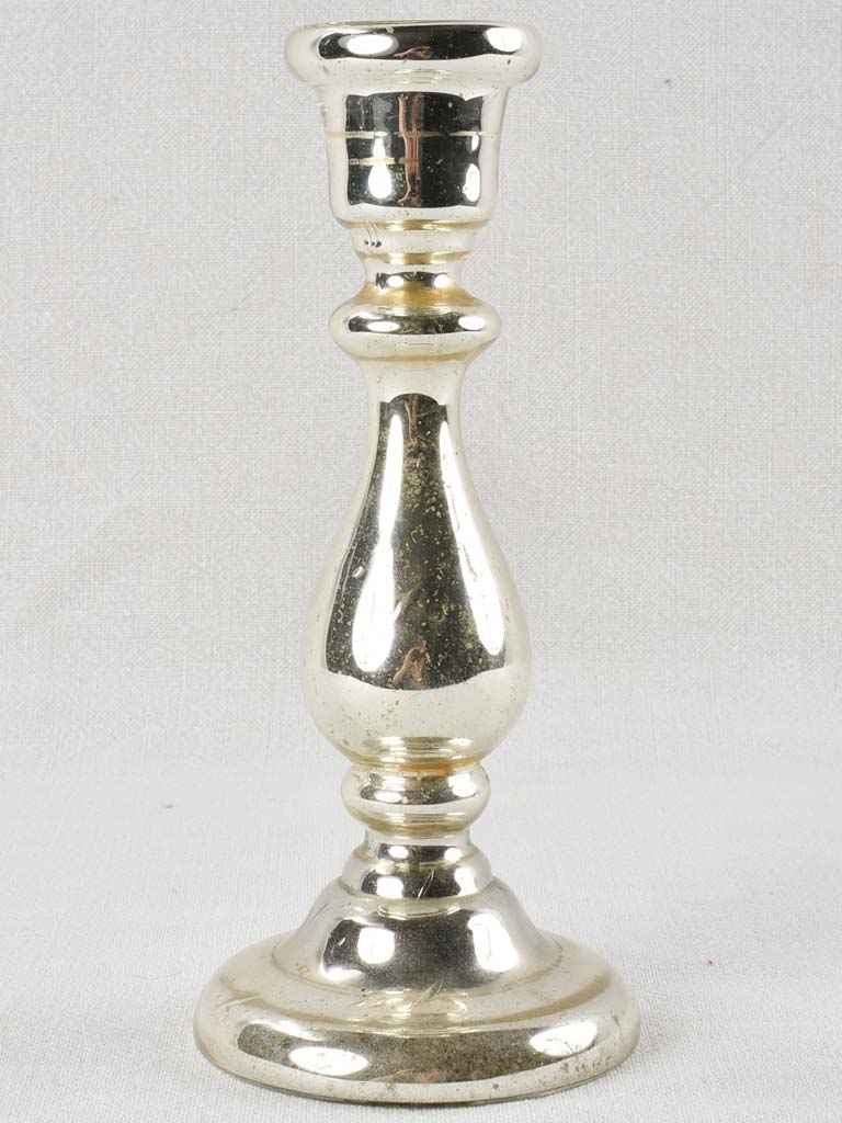 Gleaming late-eighteenth-century mercury glass candlestick