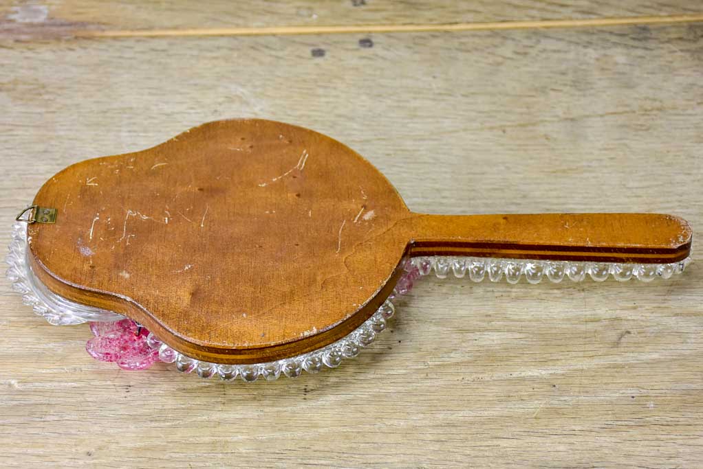 Vintage Venetian-style hand mirror with pink flowers