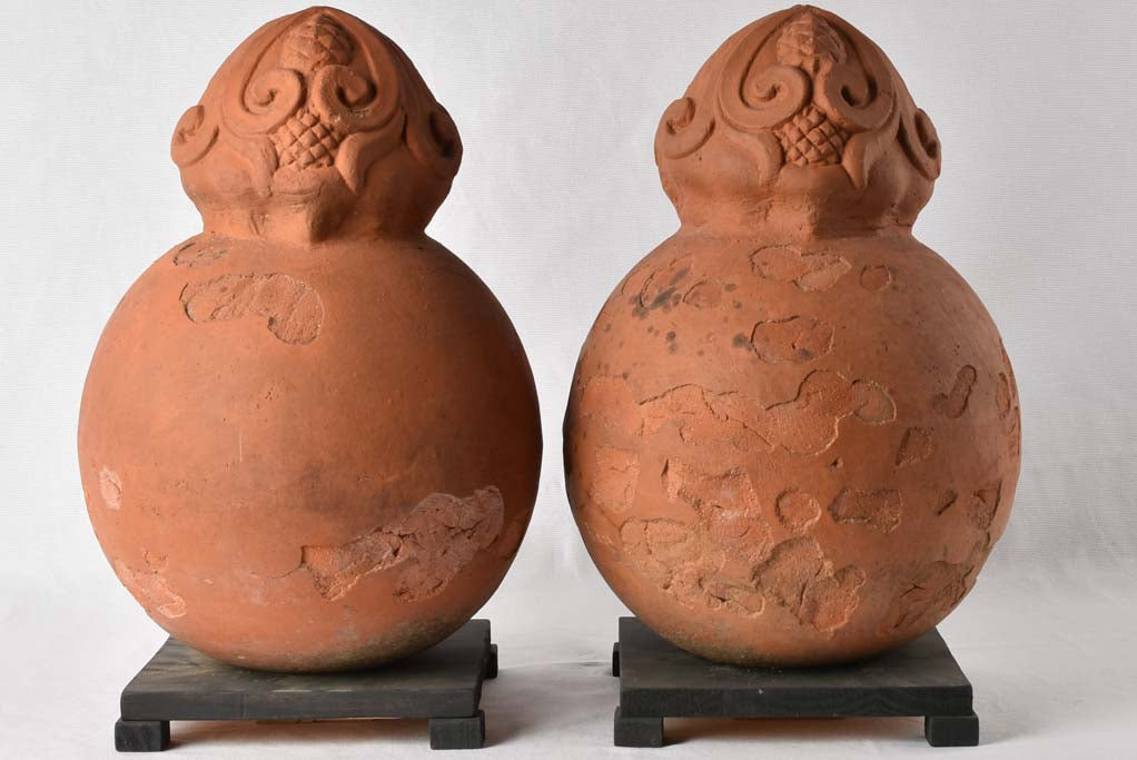 Pair of round finials with embellishments - terracotta 11¾"