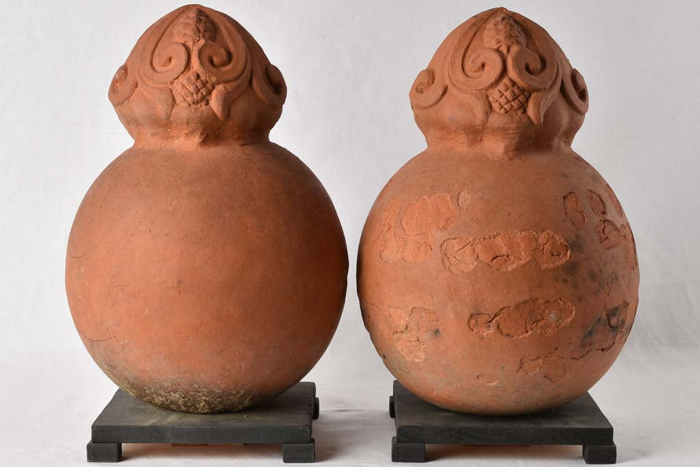 Pair of round finials with embellishments - terracotta 11¾"