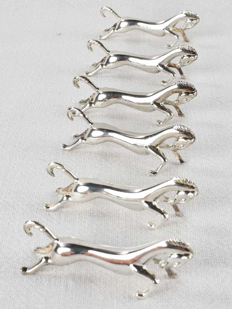 Vintage metal horse-shaped knife rests