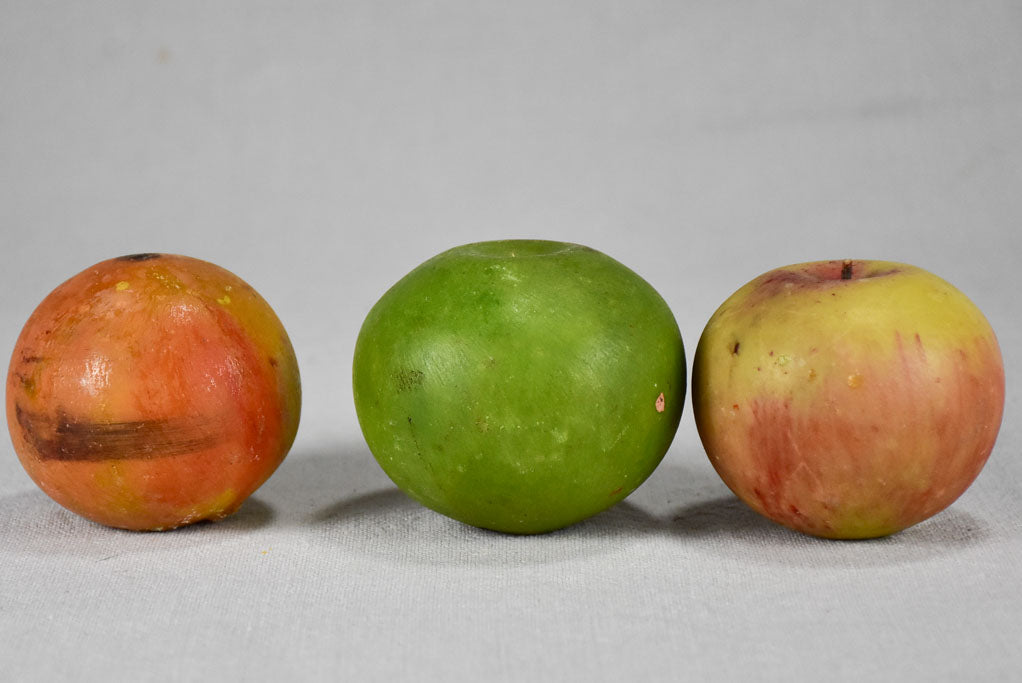 Collection of three vintage marble fruits