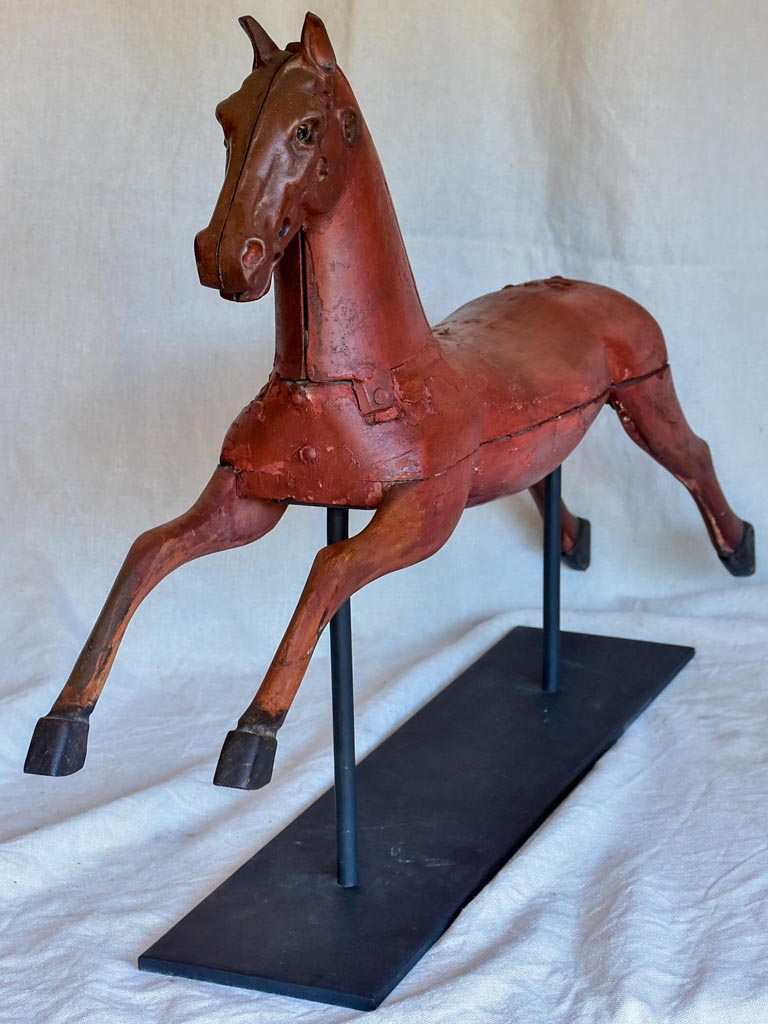 Napoleon III salvaged toy horse mounted on an iron stand