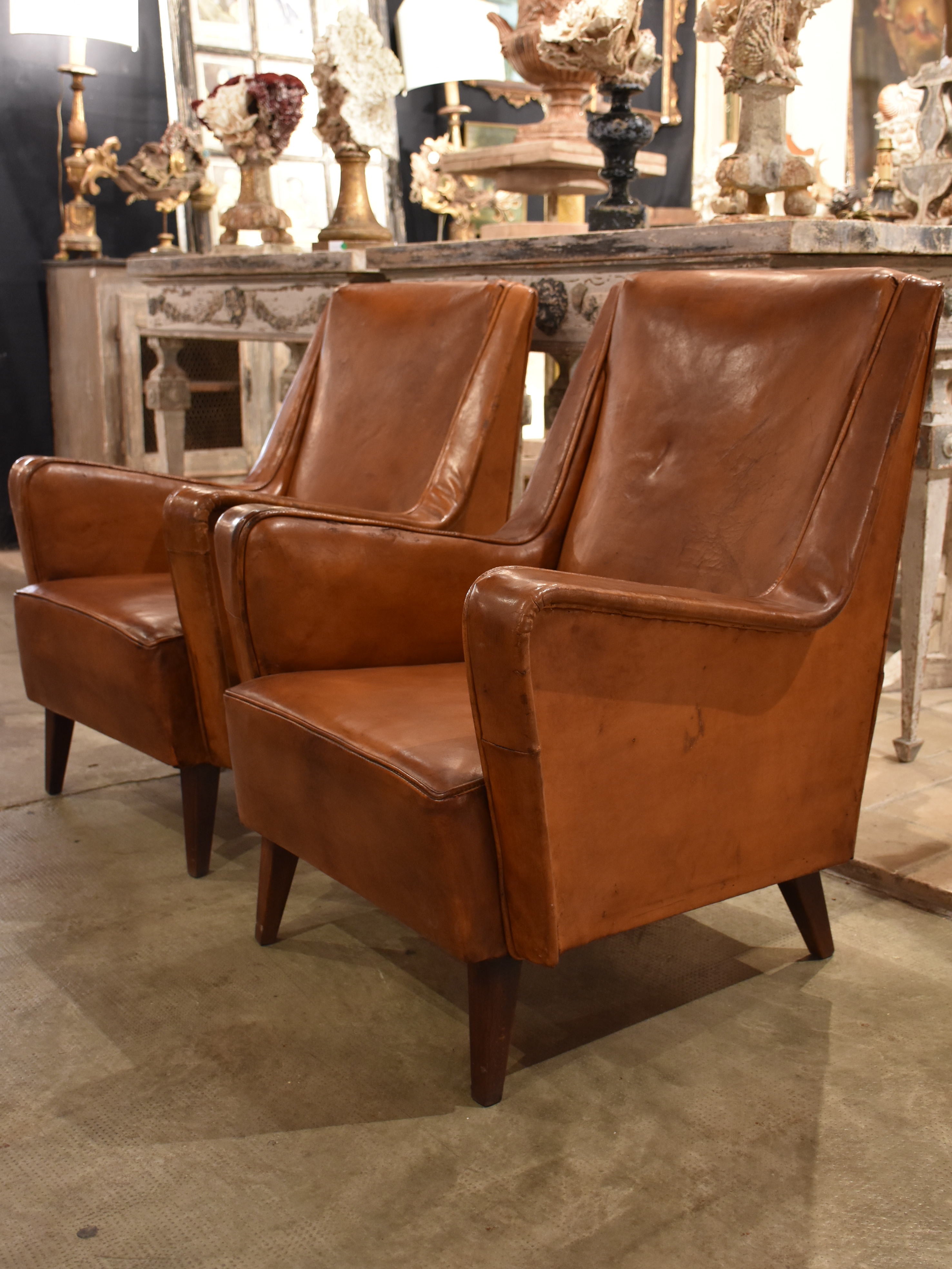 Pair of petite 1960’s leather French armchairs