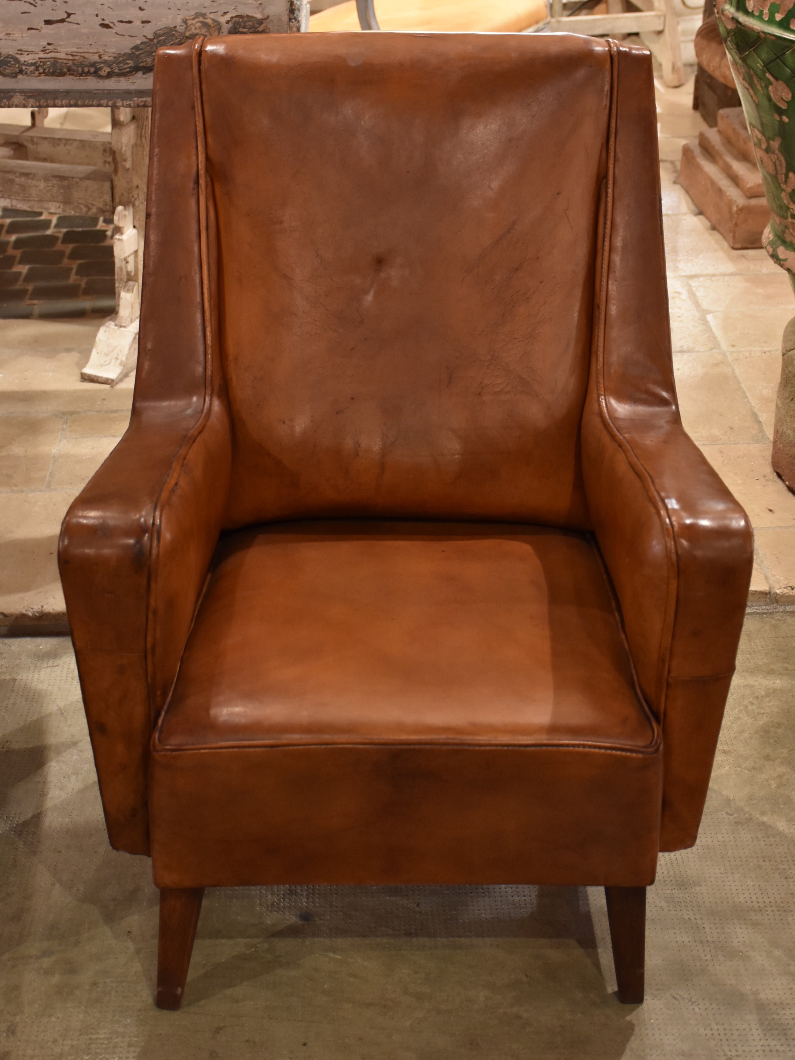 Pair of petite 1960’s leather French armchairs