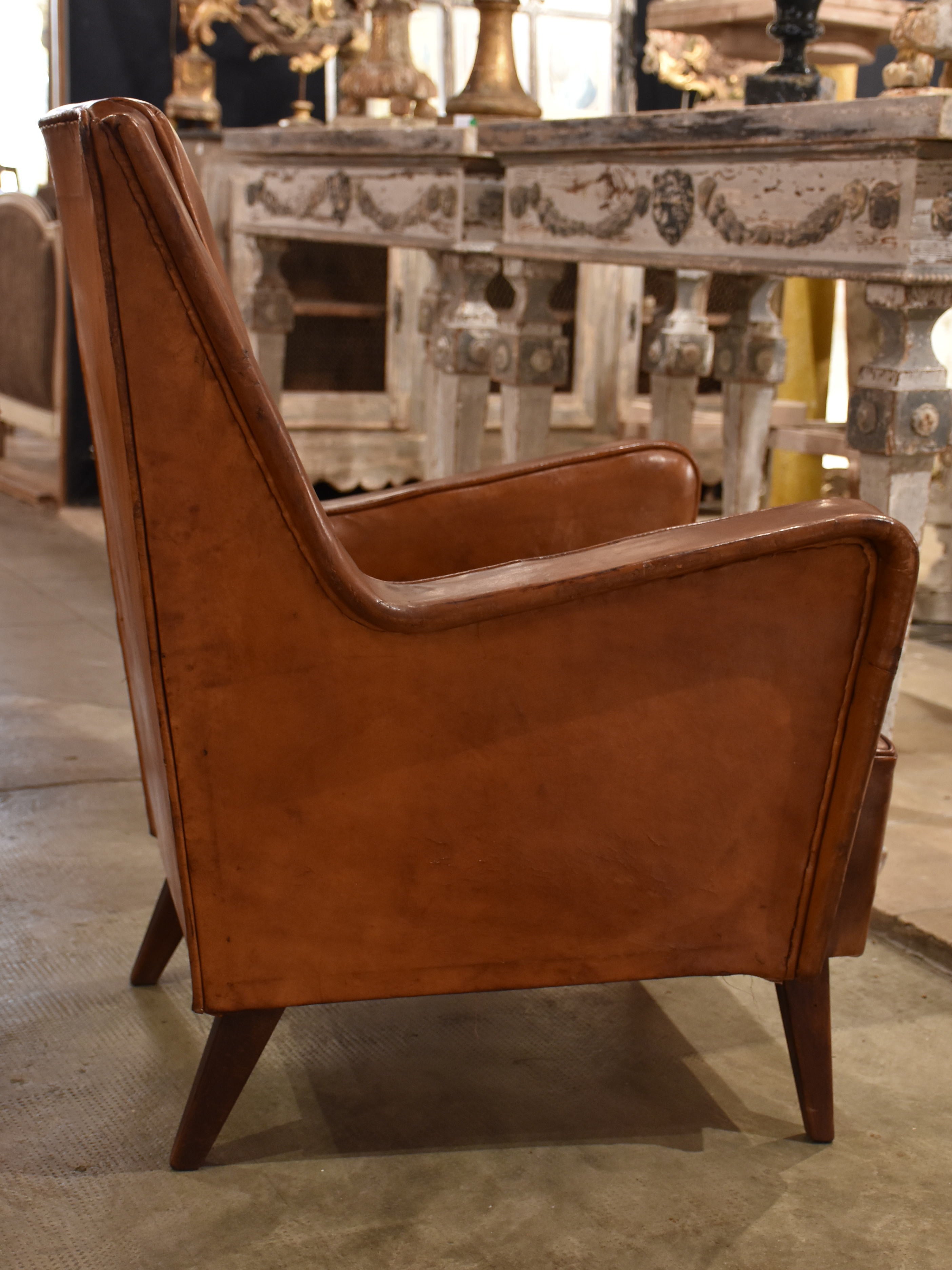 Pair of petite 1960’s leather French armchairs