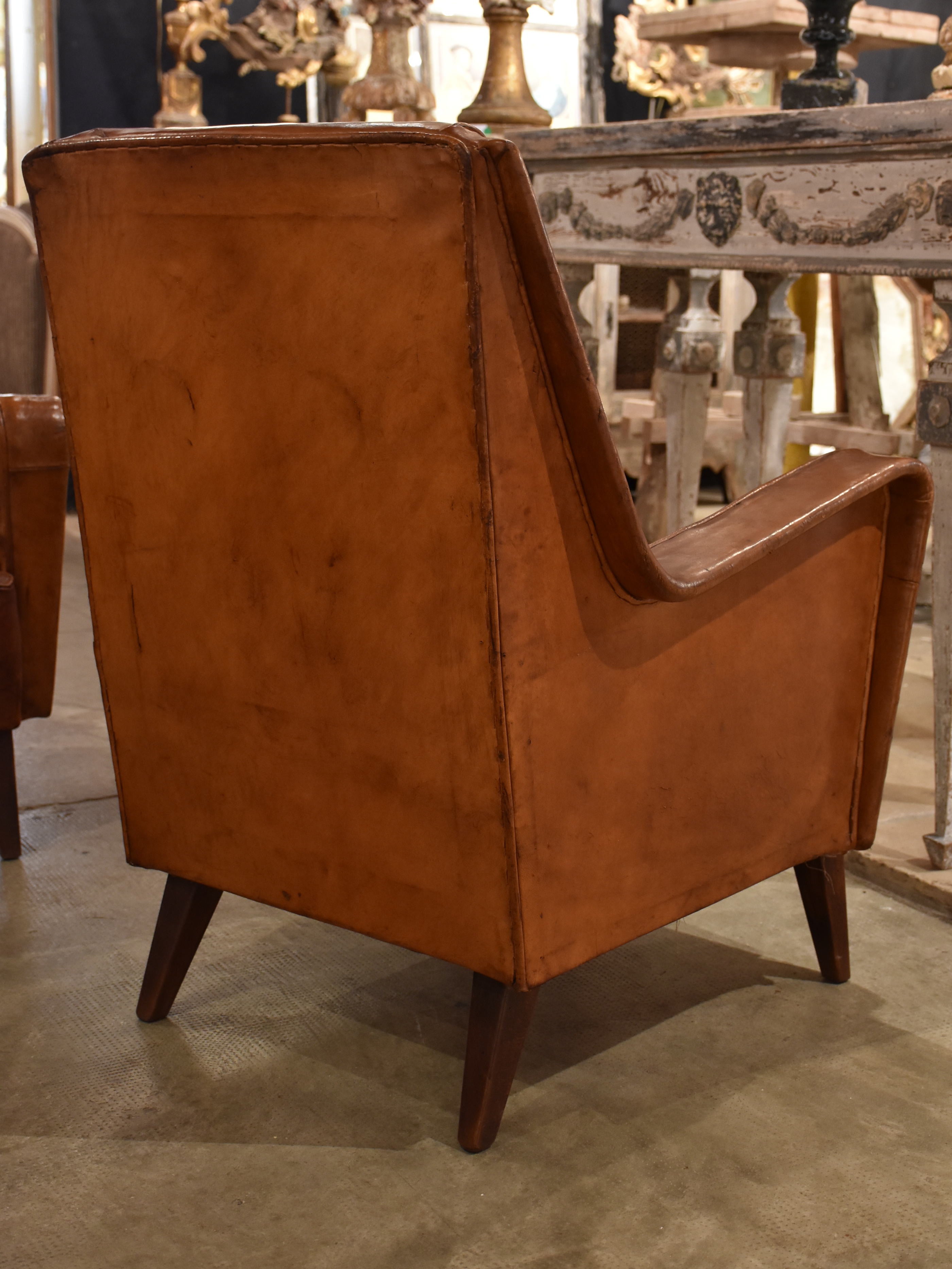 Pair of petite 1960’s leather French armchairs