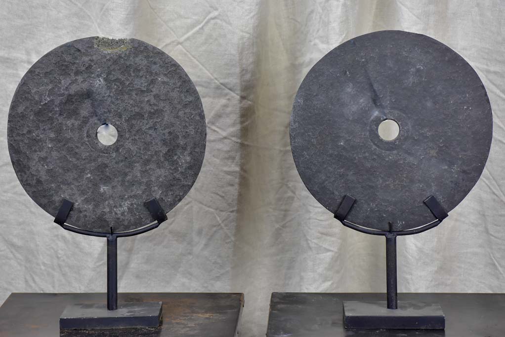 Pair of mounted stone discs from Papua New Guinea