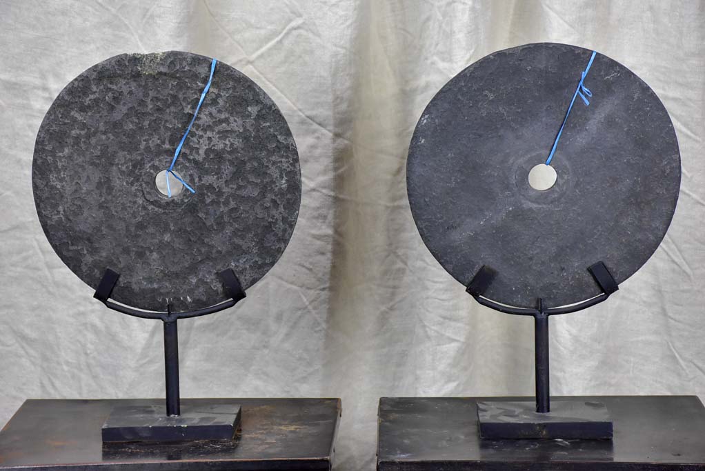 Pair of mounted stone discs from Papua New Guinea