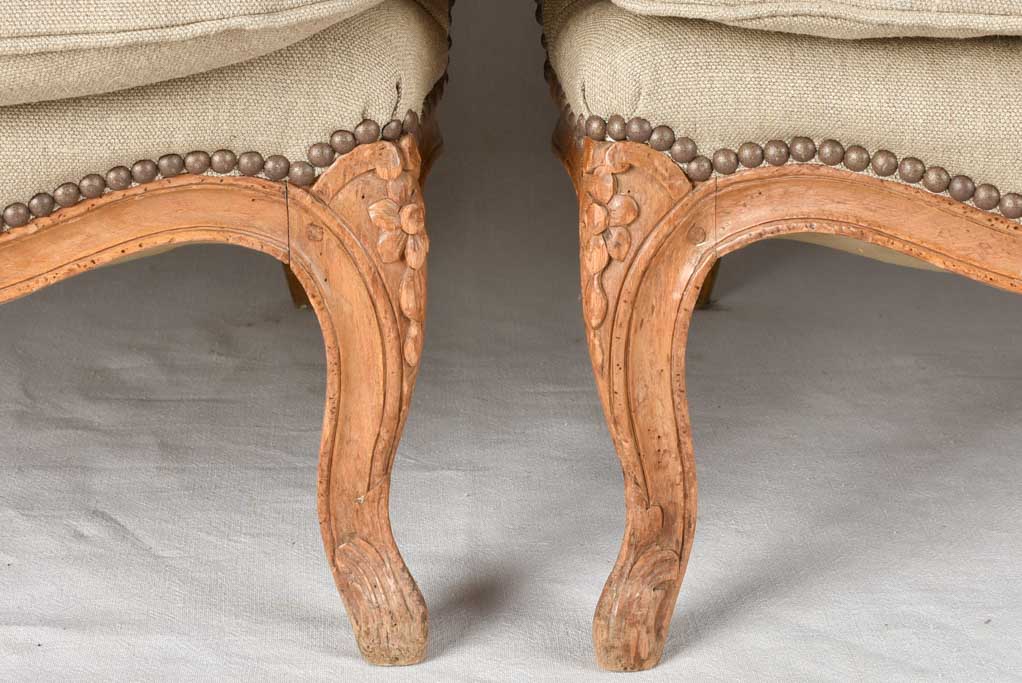 Large pair of 19th century Bergere armchairs with new linen uphostery