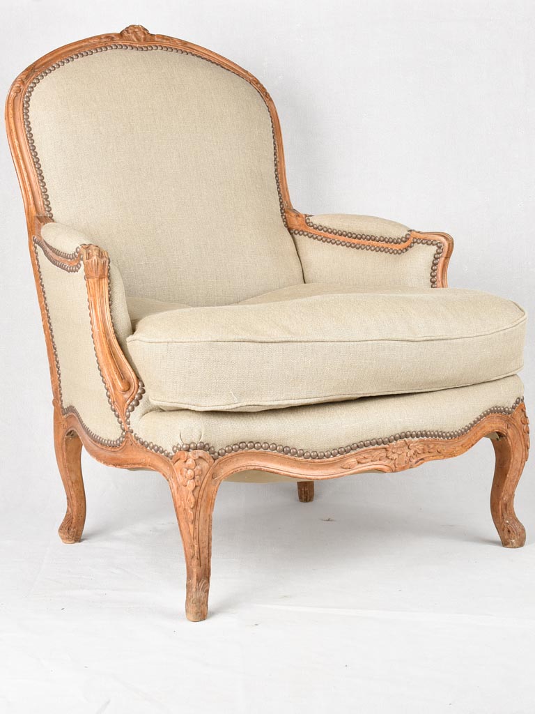 Large pair of 19th century Bergere armchairs with new linen uphostery