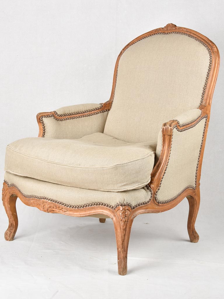 Large pair of 19th century Bergere armchairs with new linen uphostery