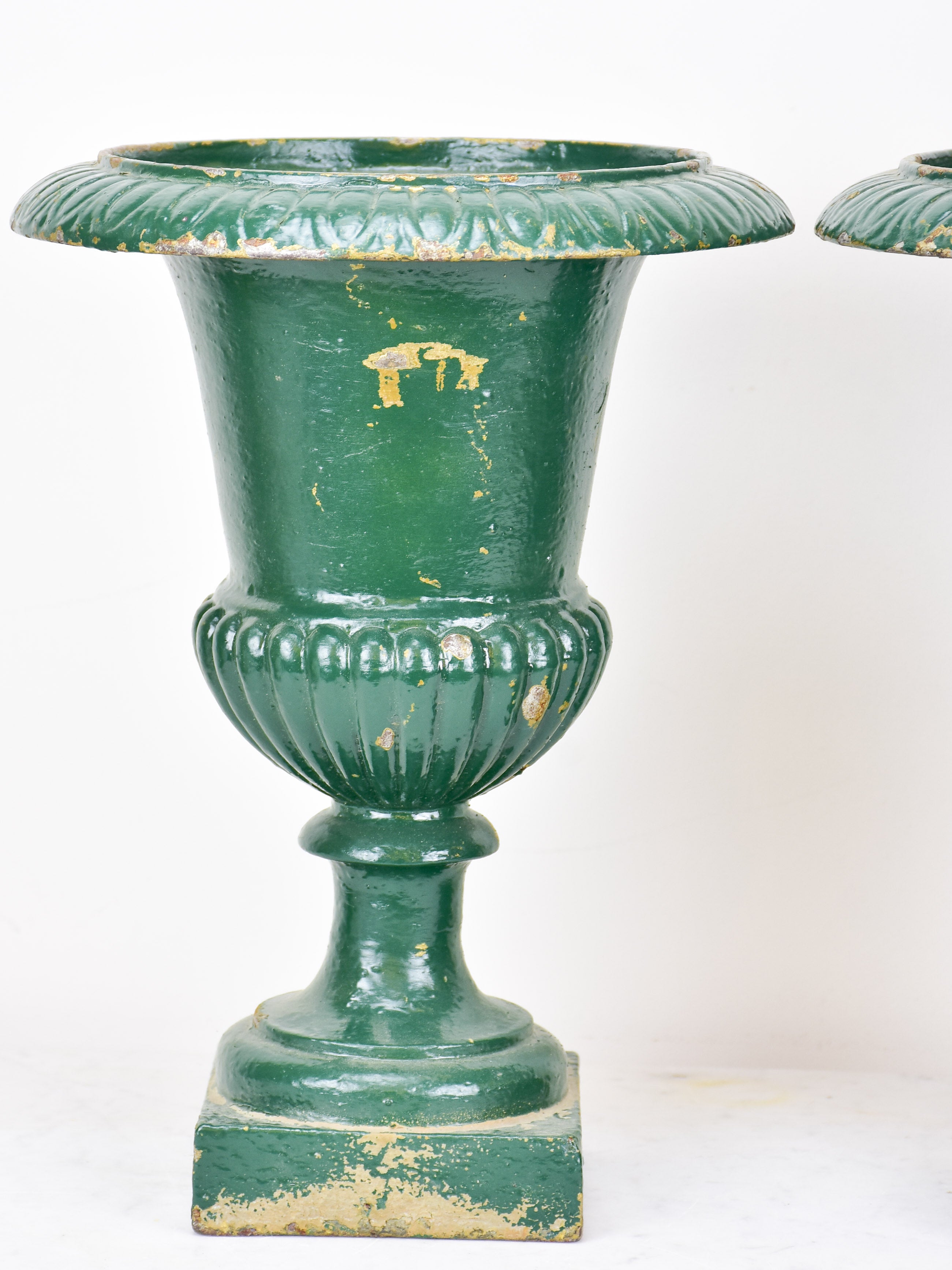 Pair of antique French Medici urns - green