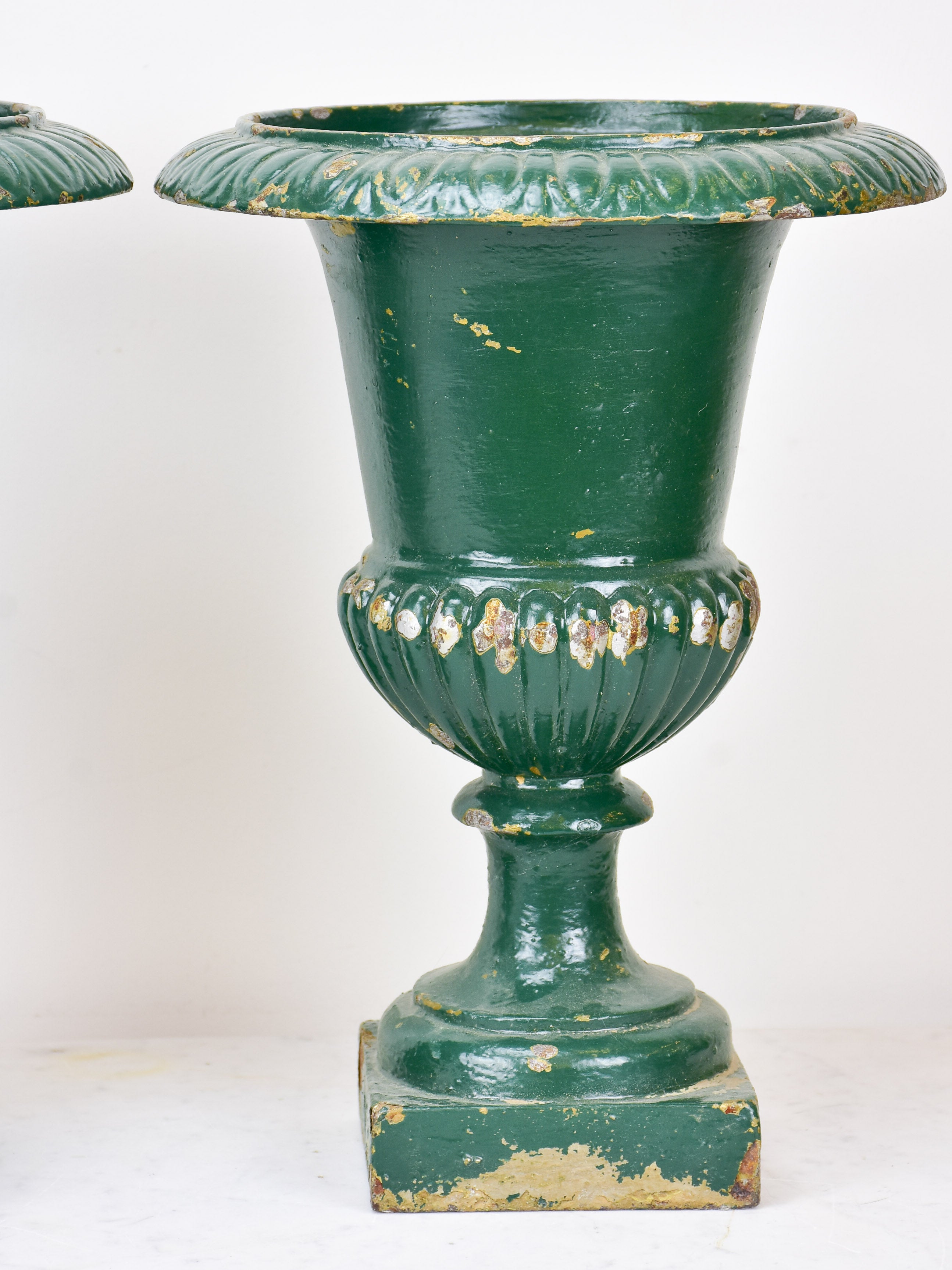 Pair of antique French Medici urns - green