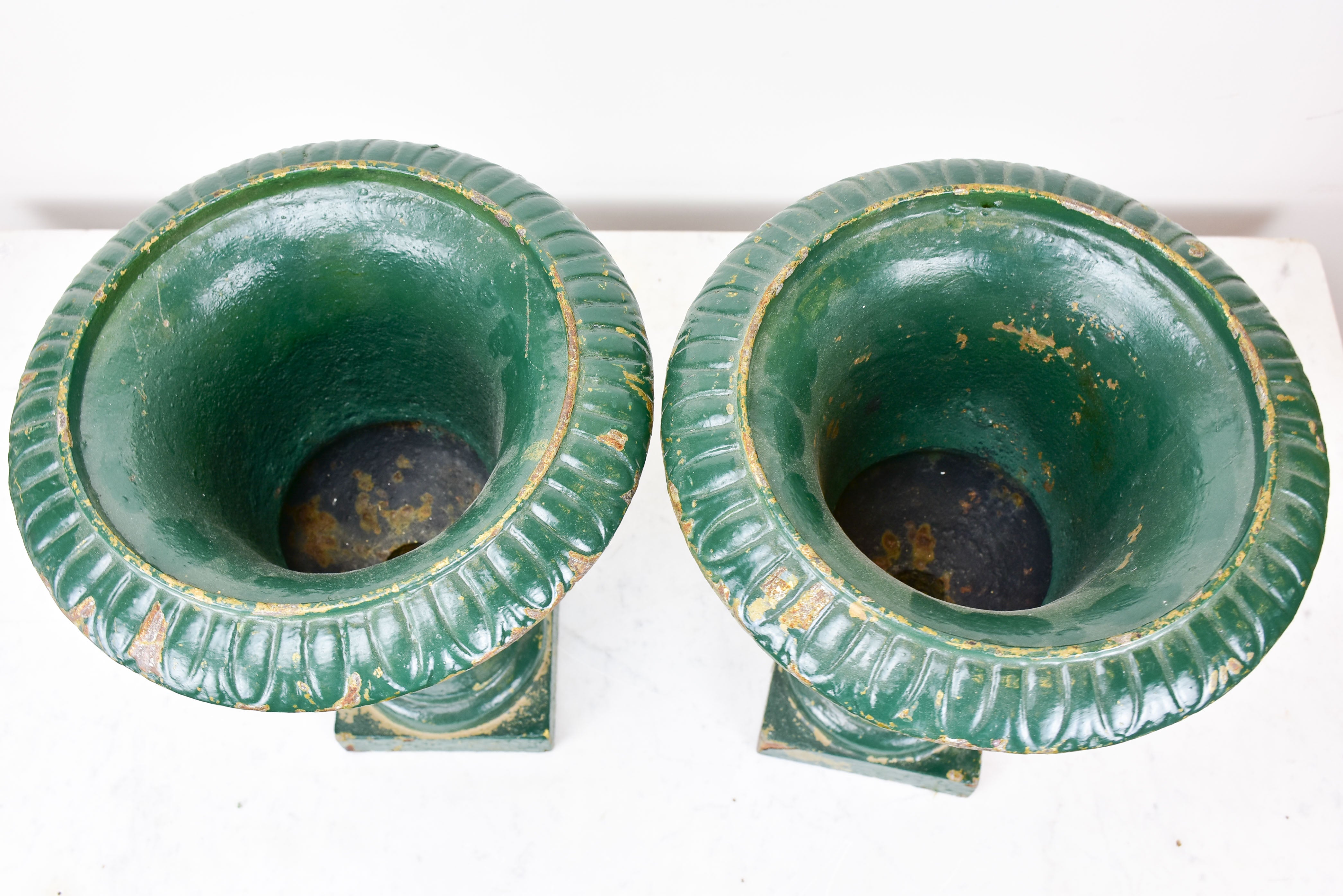 Pair of antique French Medici urns - green