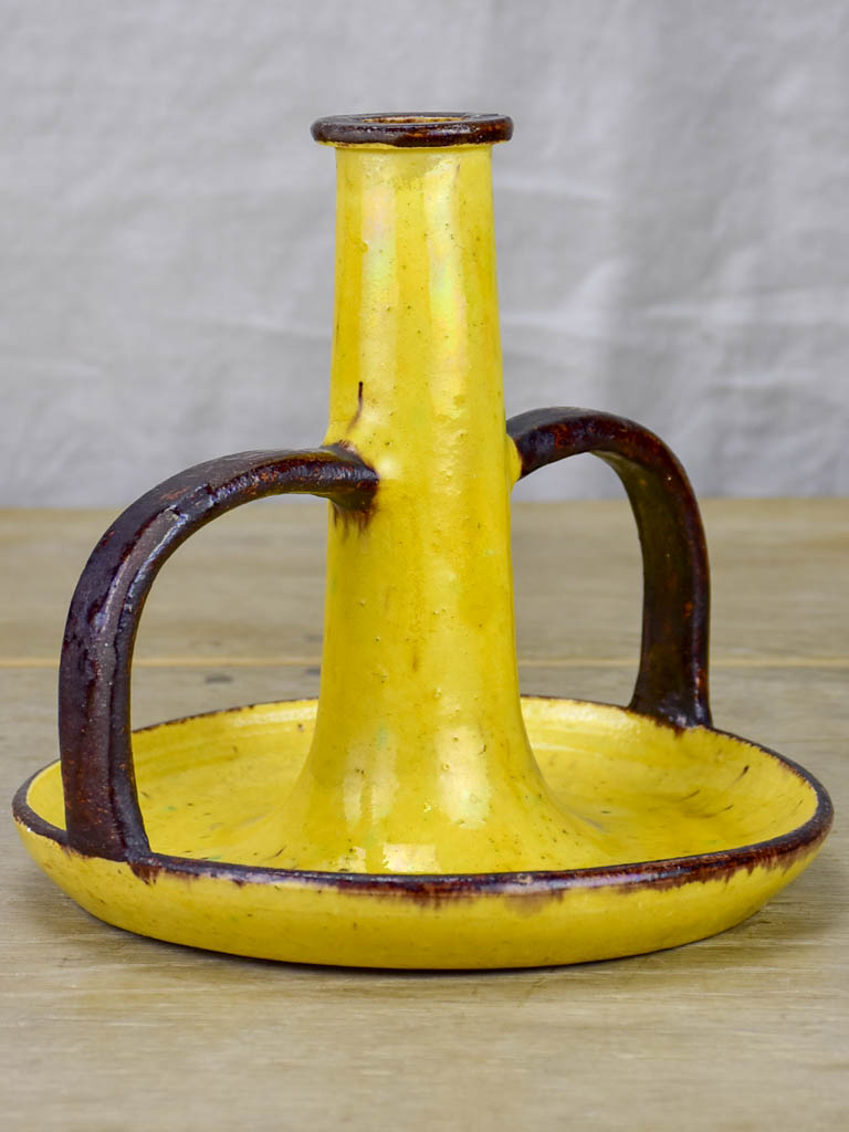 1930's Etienne Noel ceramic candlestick with yellow and brown glaze