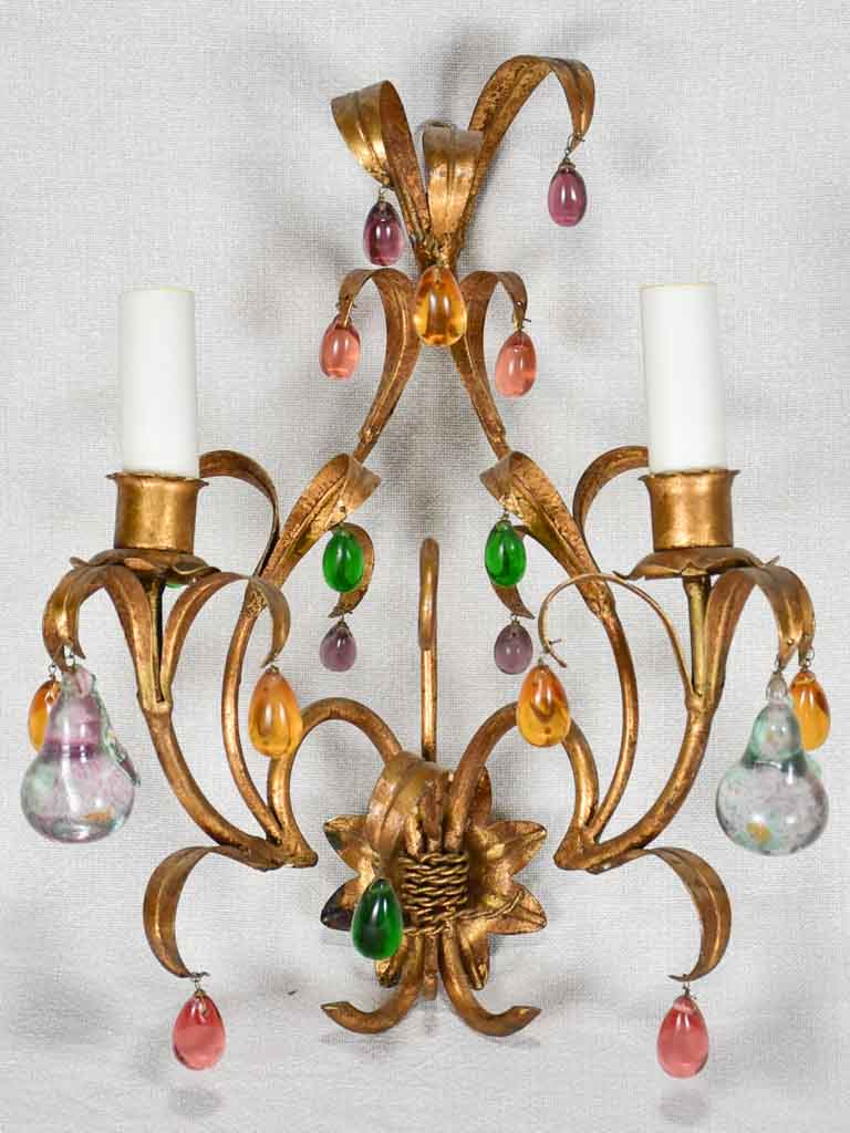 Three gold 1950s wall sconces with colorful glass fruits and pendants 13¾"