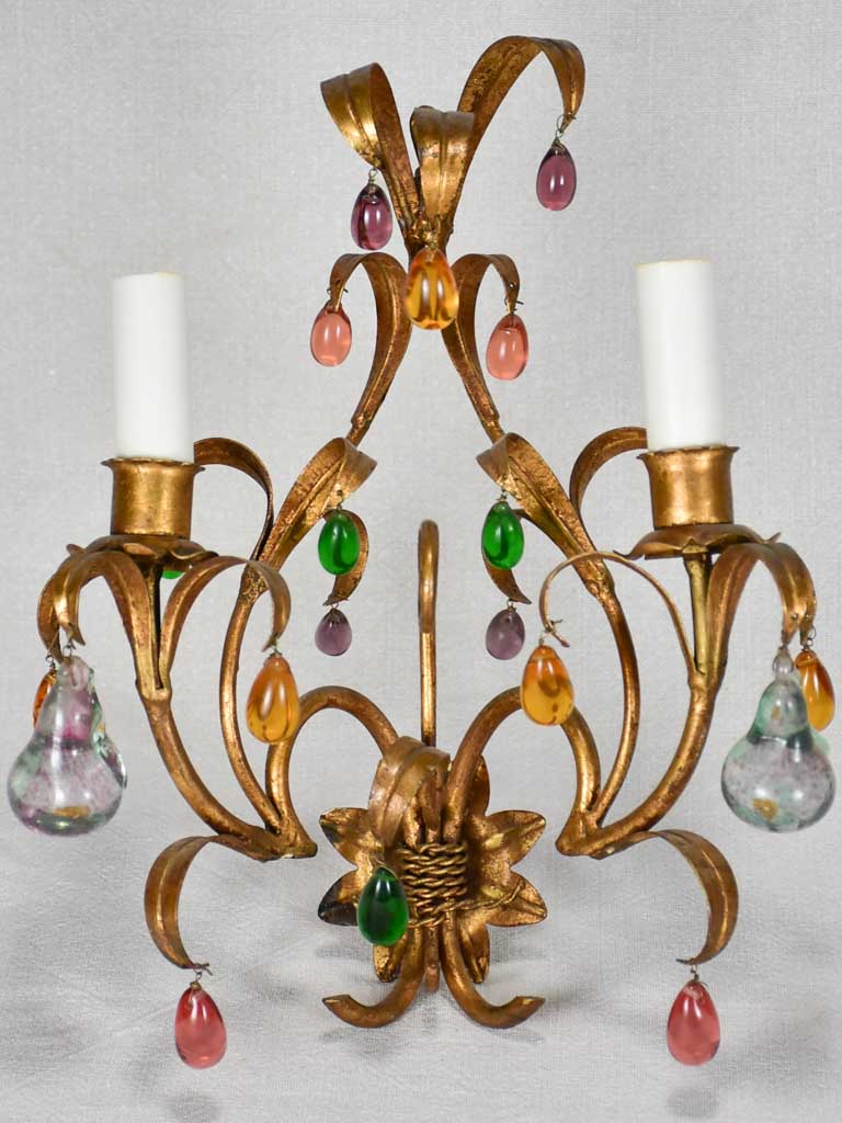 Three gold 1950s wall sconces with colorful glass fruits and pendants 13¾"