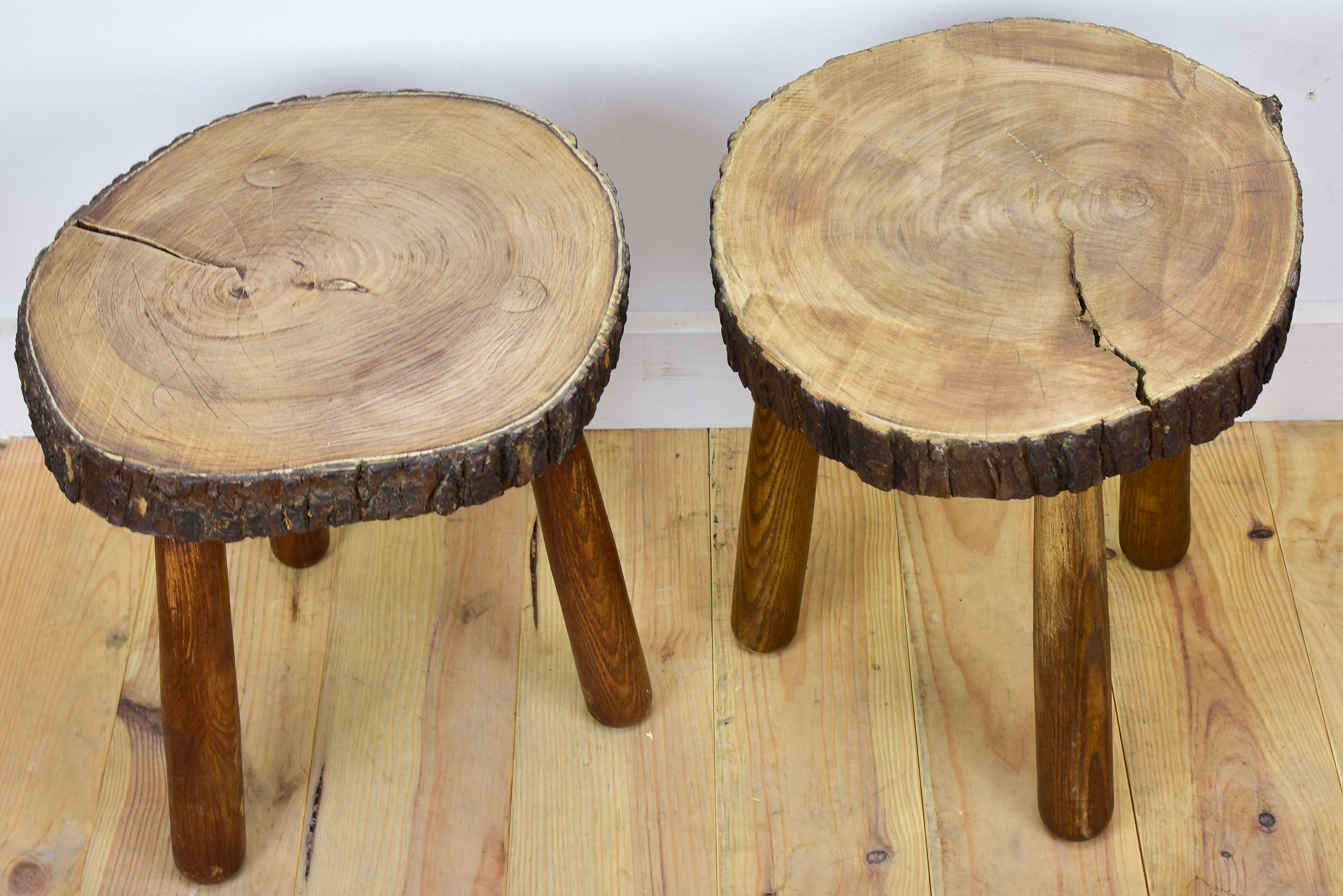 Two vintage French elmwood stools / side tables