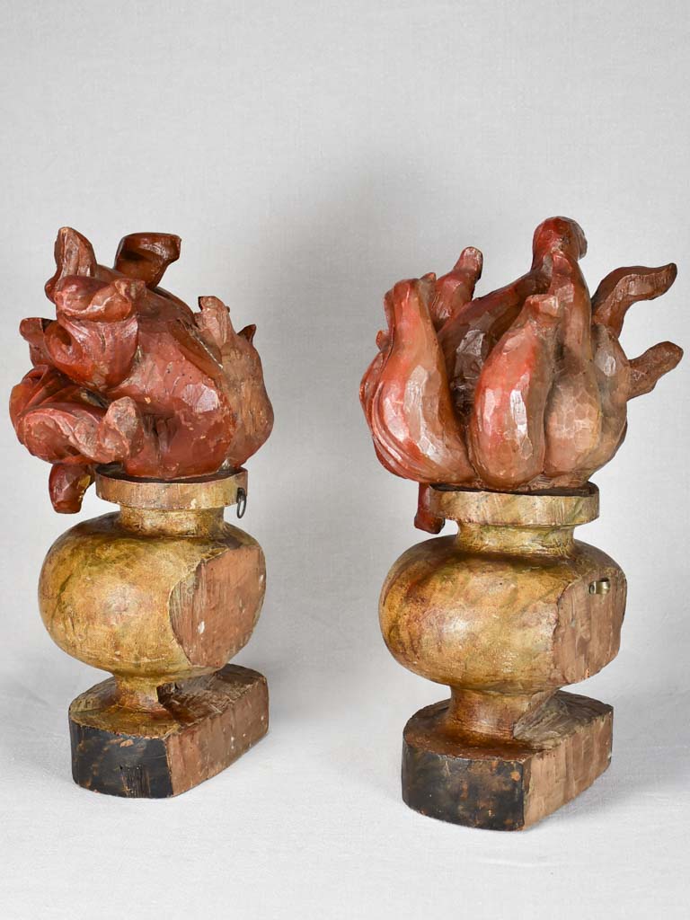 Pair of Louis XIV carved wood decorative flame elements 18"