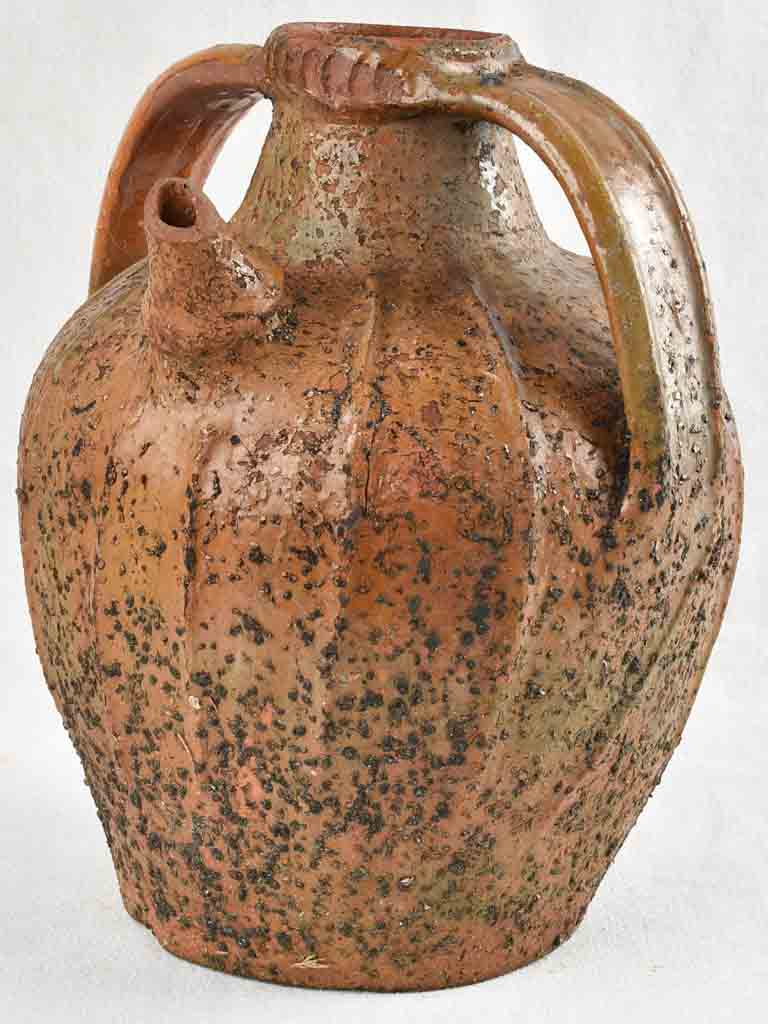 Antique French walnut oil pitcher from the Auvergne - terracotta - 15"