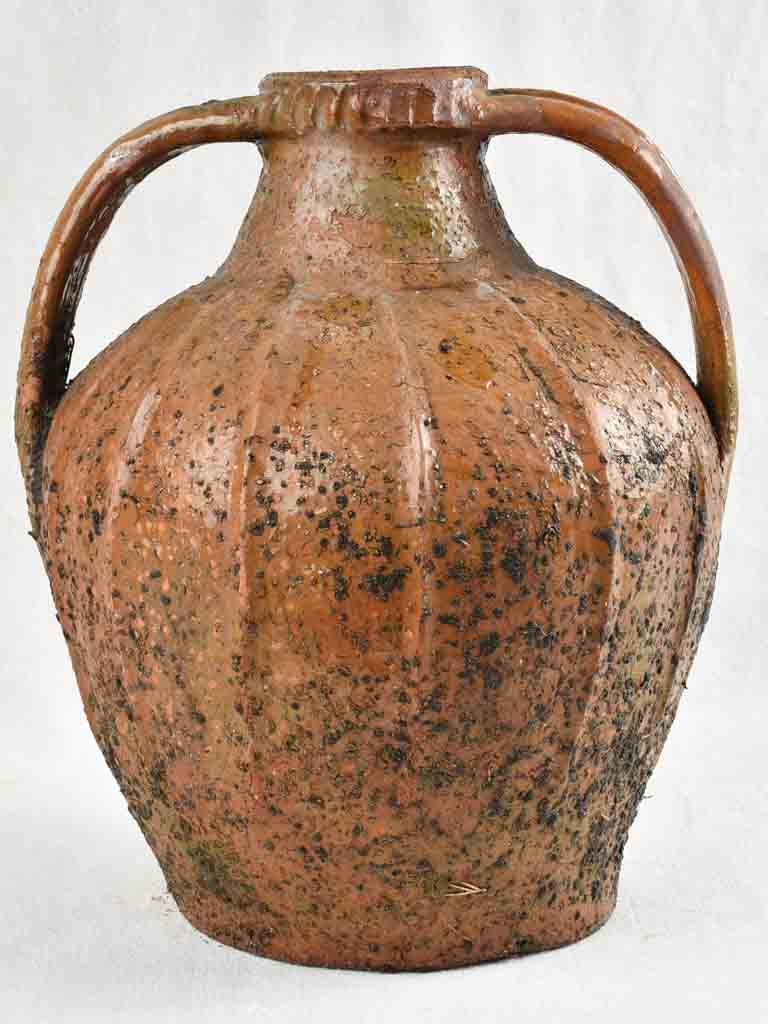 Antique French walnut oil pitcher from the Auvergne - terracotta - 15"