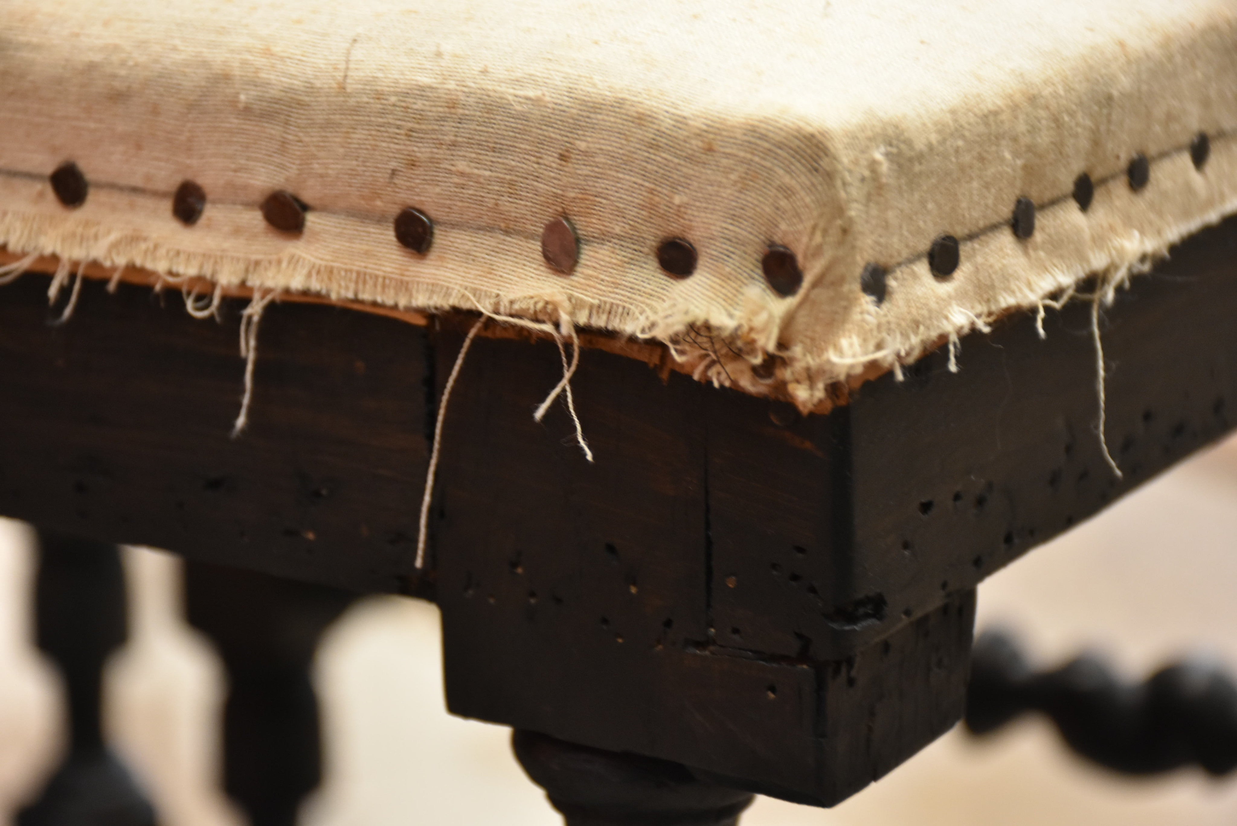 Pair of Louis XIII style stools with black patina