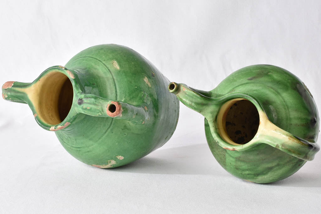 2 terracotta pitchers / orjols w/ green glaze 9½"