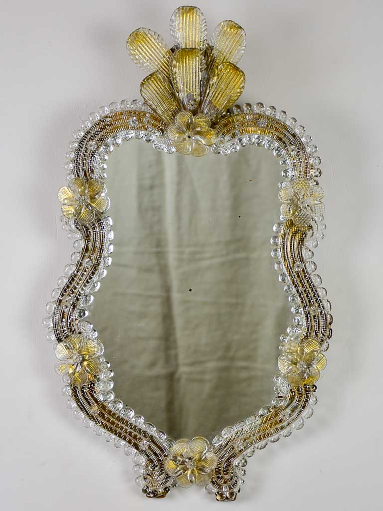 Vintage Venetian style mirror with gold leaves and flowers