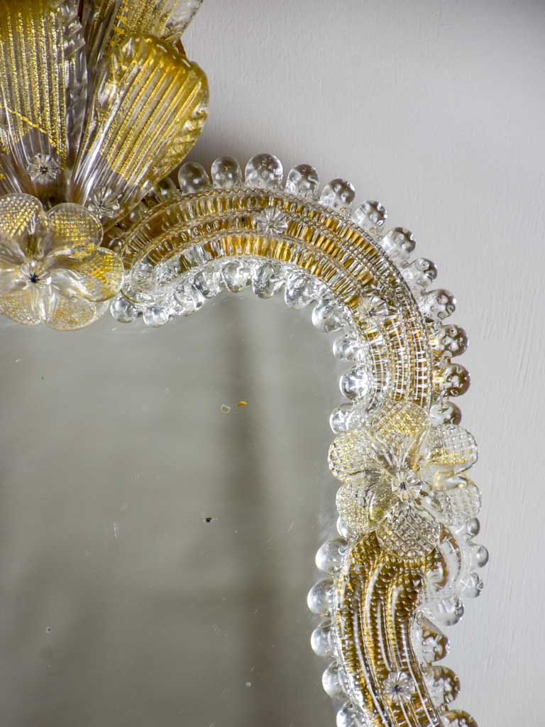 Vintage Venetian style mirror with gold leaves and flowers