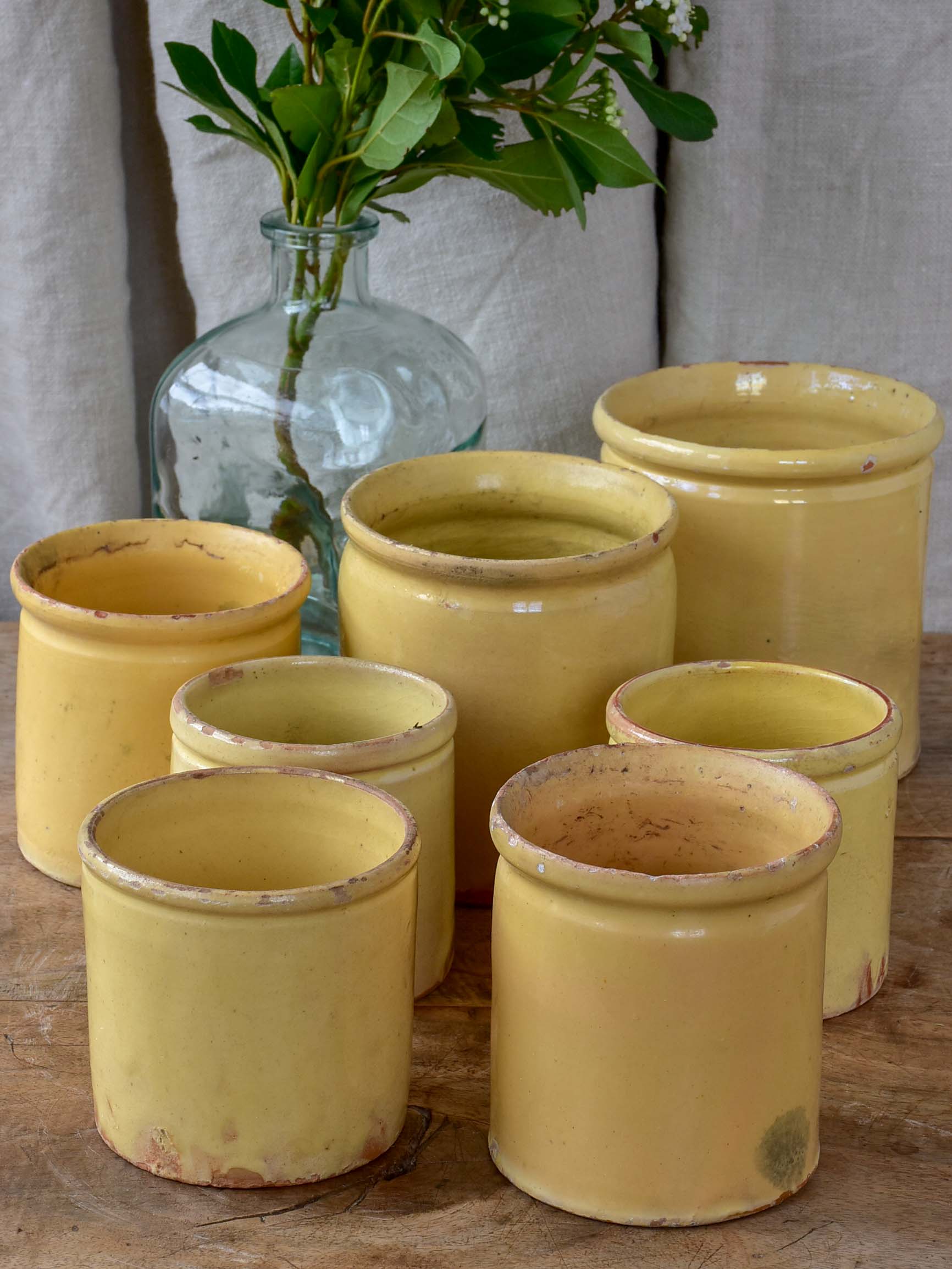 Collection of 7 antique French yellow ware pots