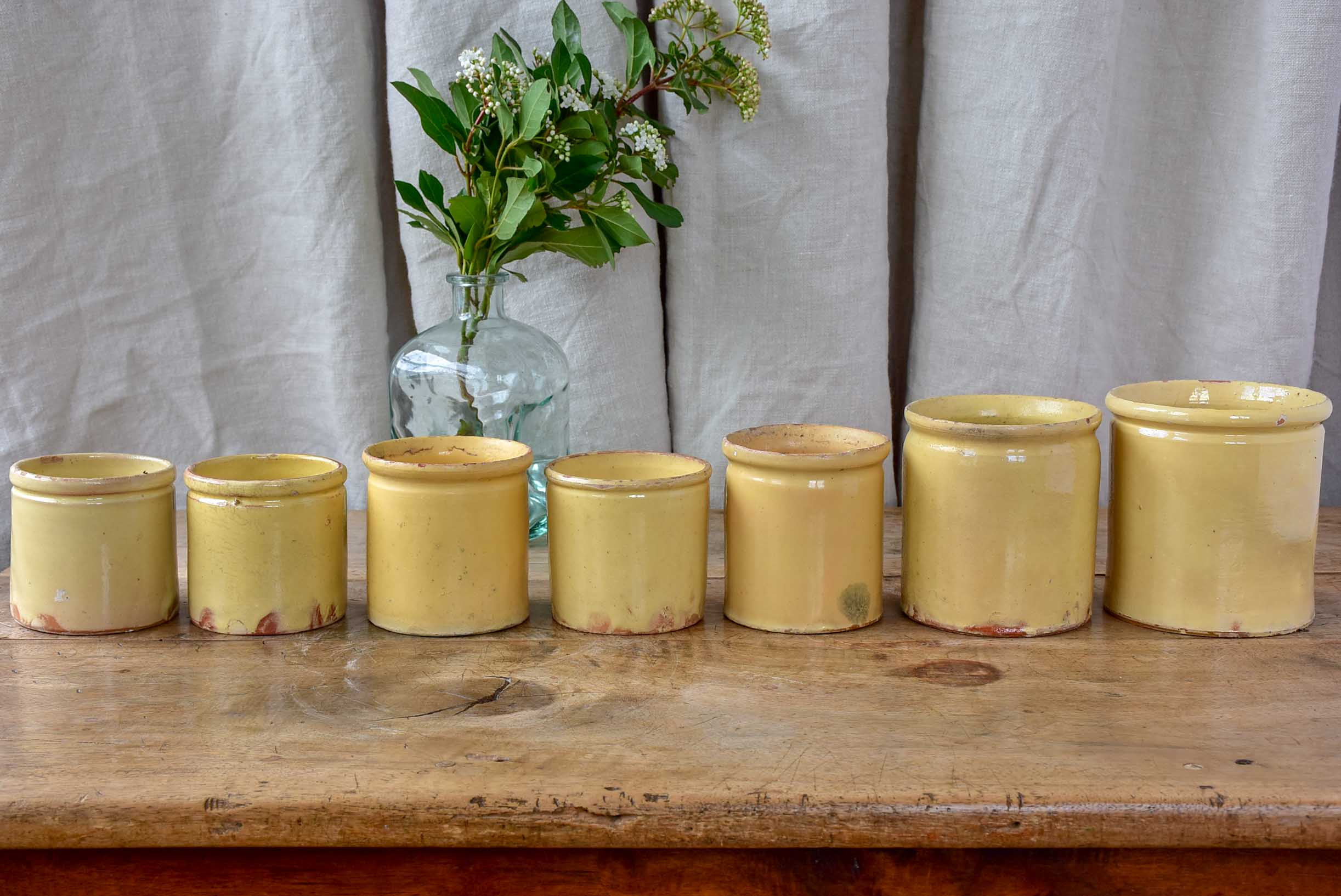 Collection of 7 antique French yellow ware pots