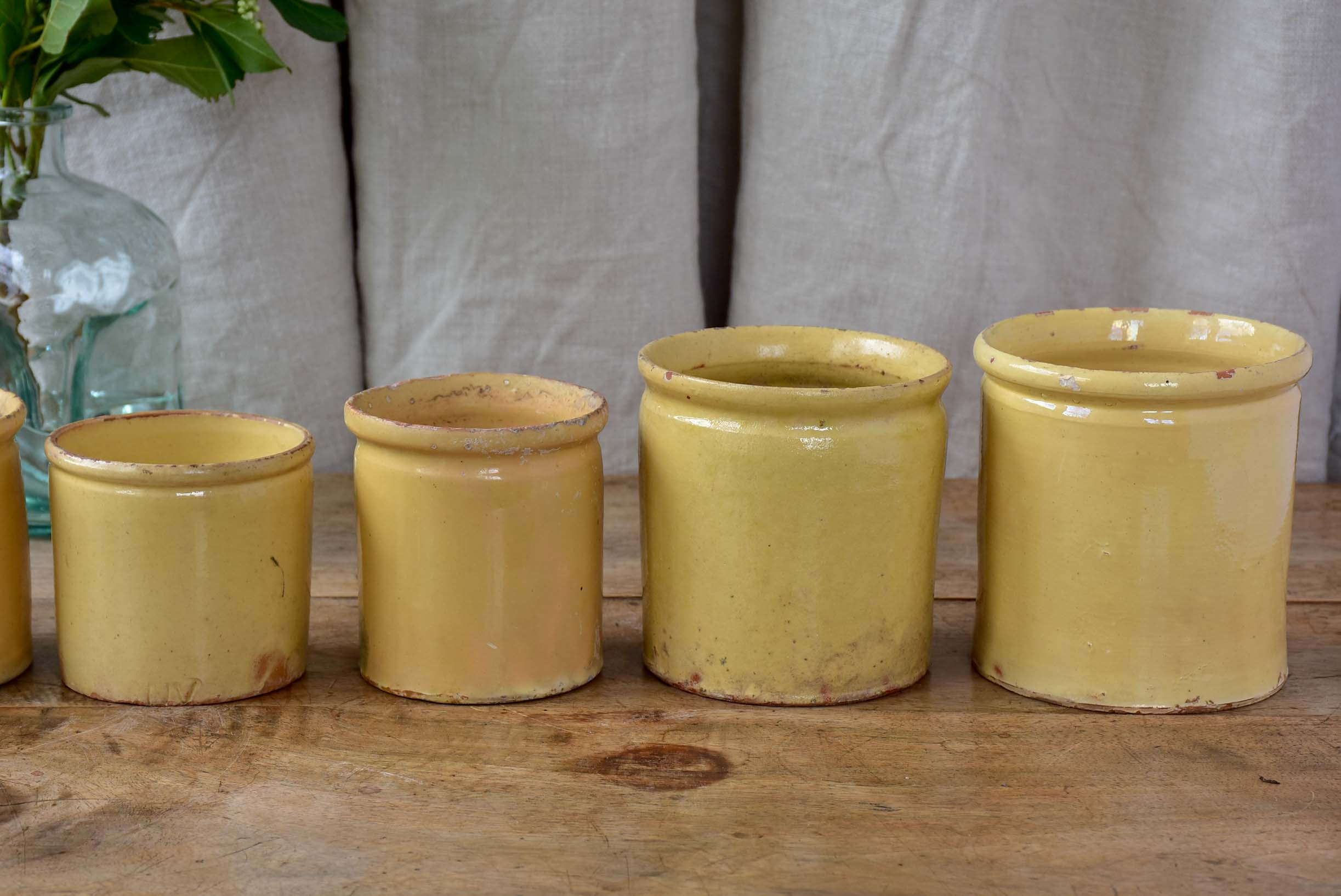 Collection of 7 antique French yellow ware pots