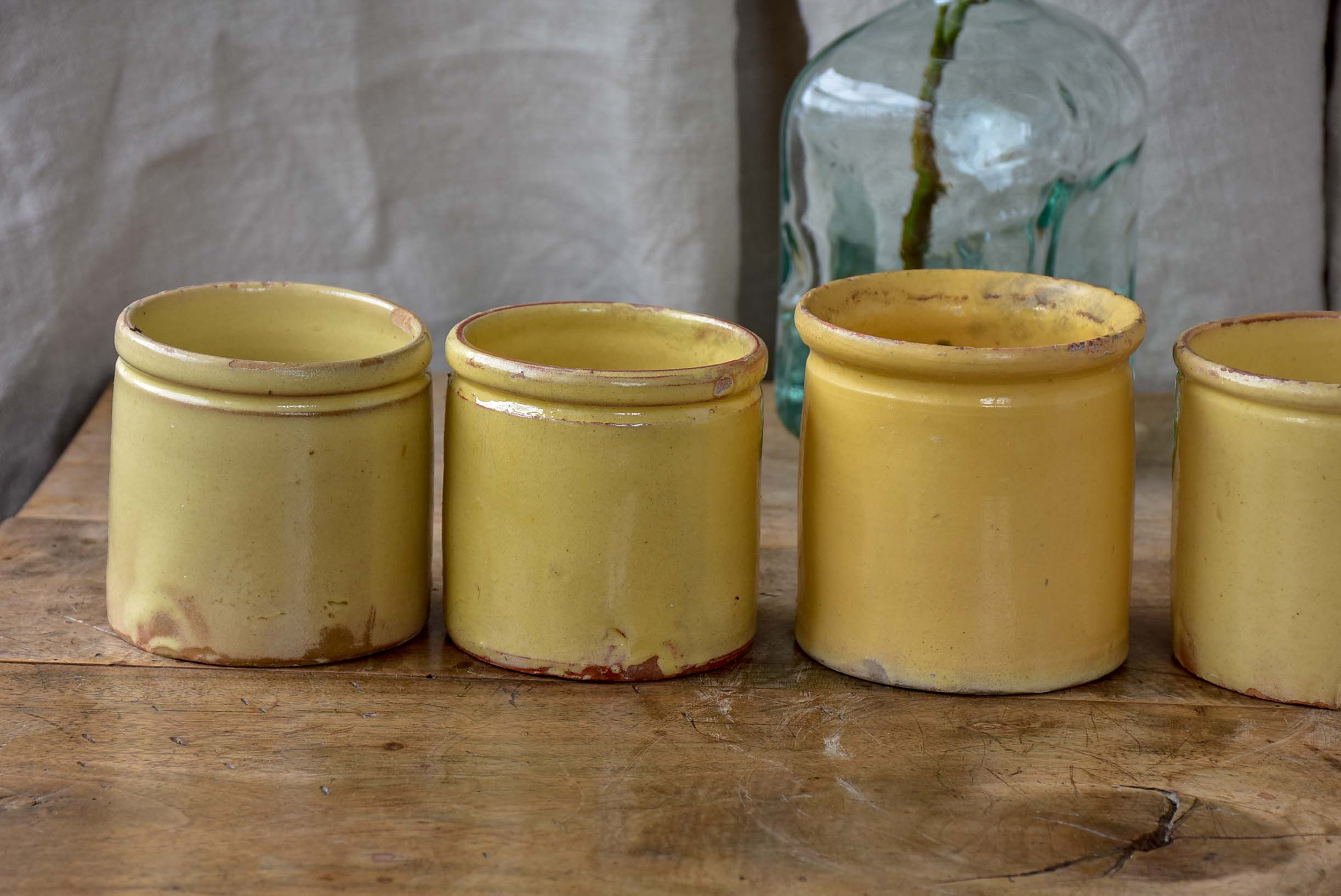 Collection of 7 antique French yellow ware pots