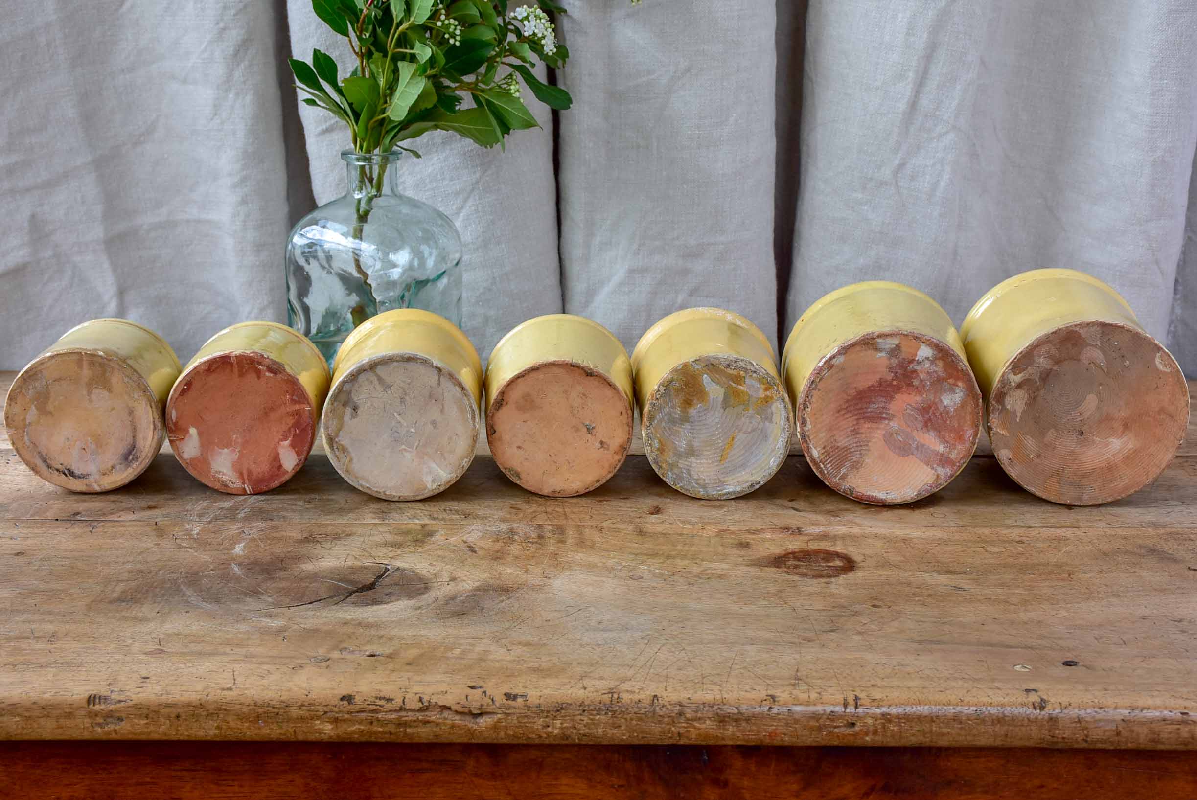 Collection of 7 antique French yellow ware pots