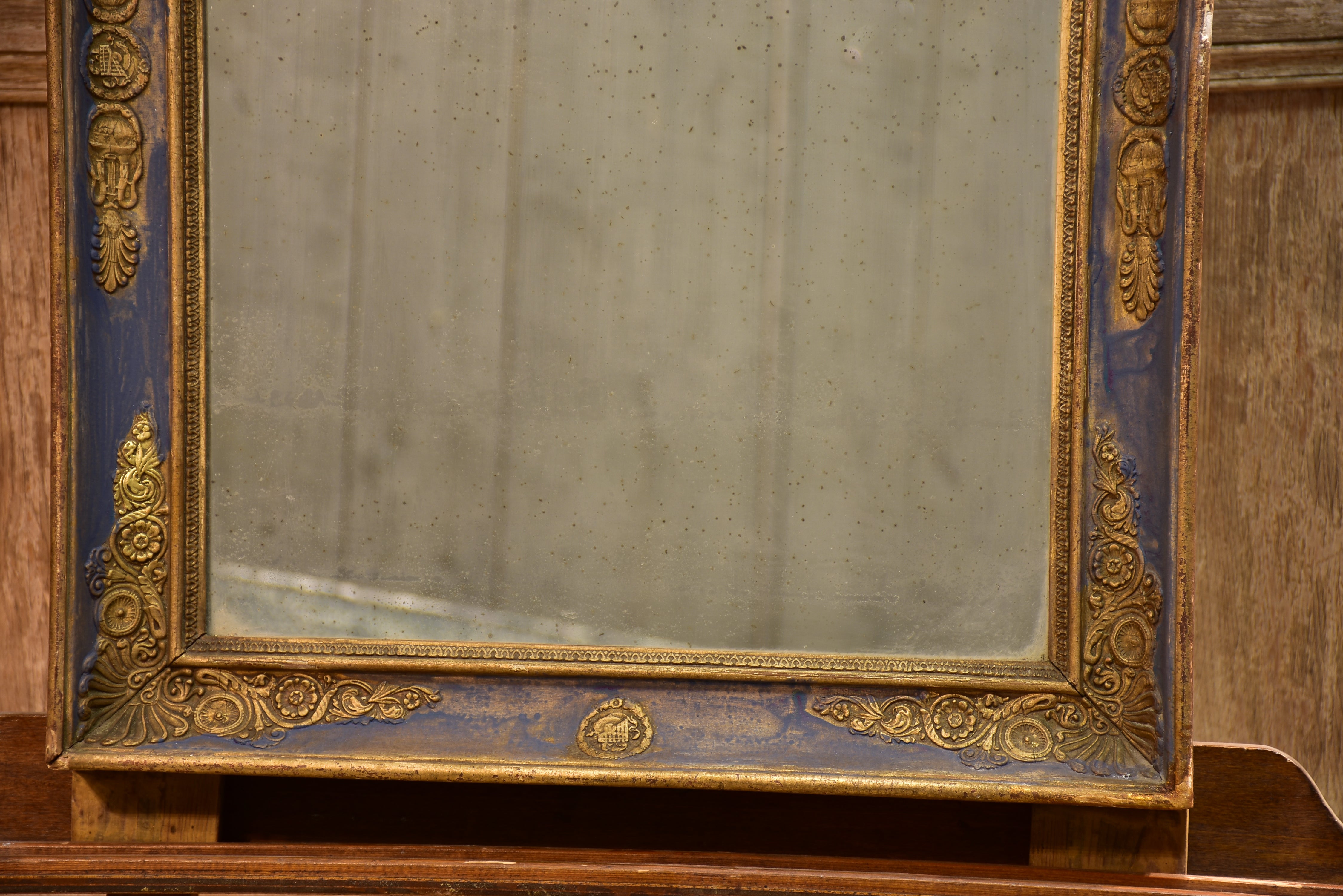 Early 19th century French restoration mirror with blue patina