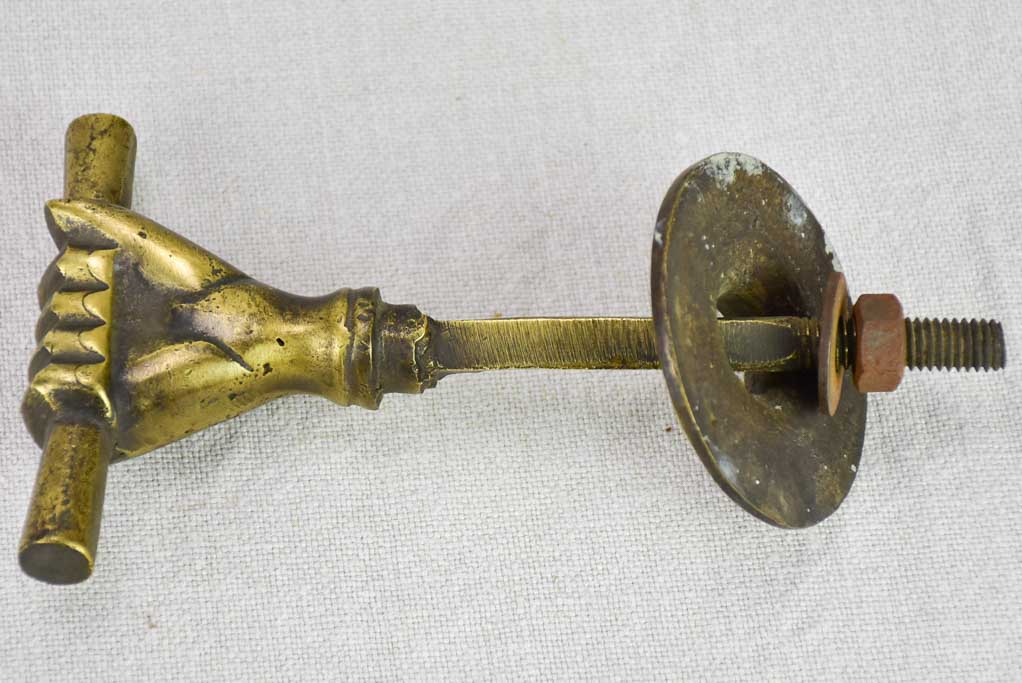 Four 19th Century english door handles in the shape of hands