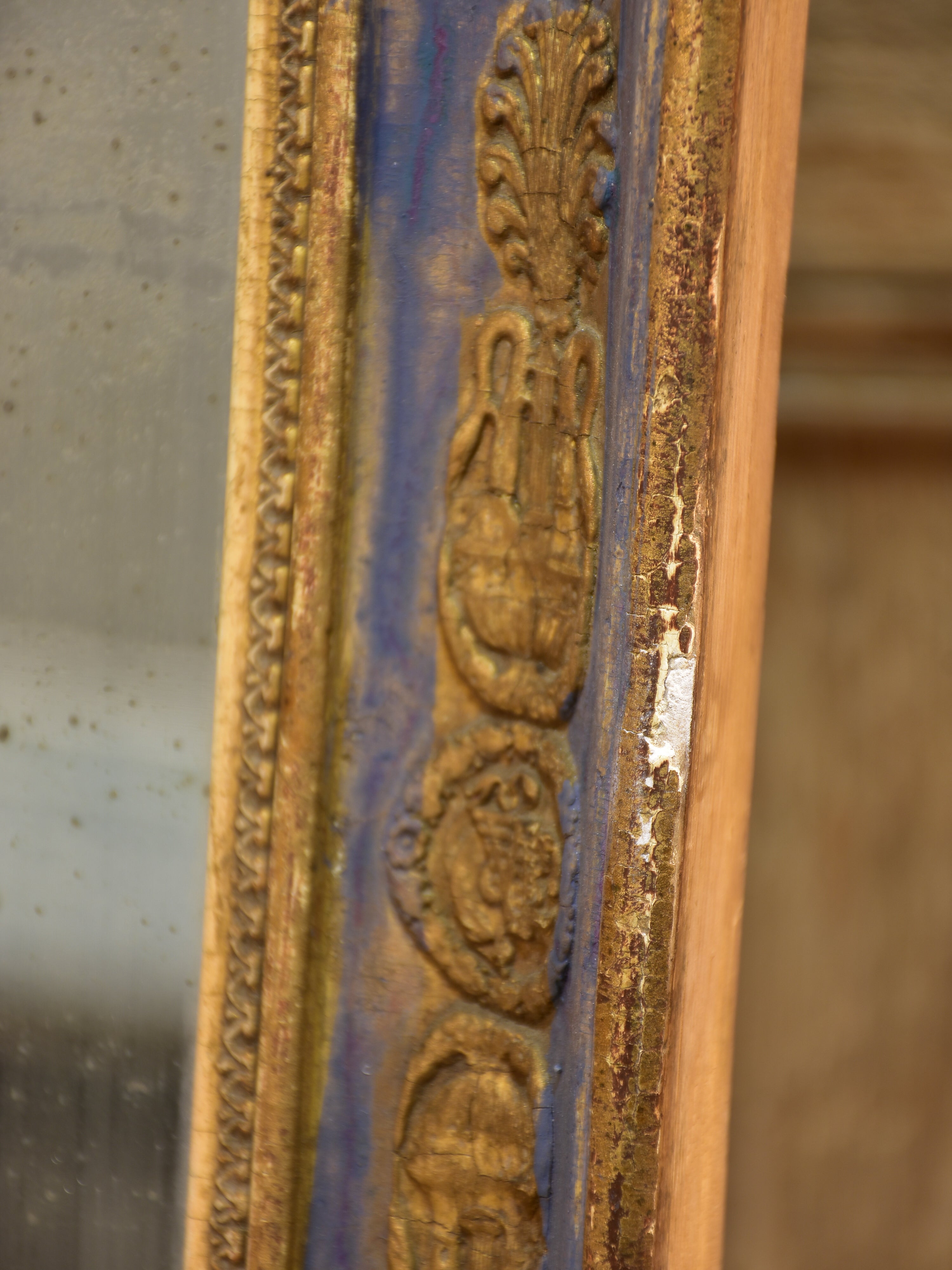 Early 19th century French restoration mirror with blue patina