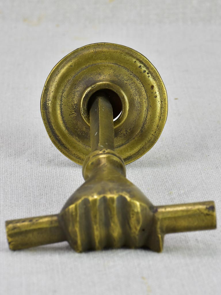 Four 19th Century english door handles in the shape of hands