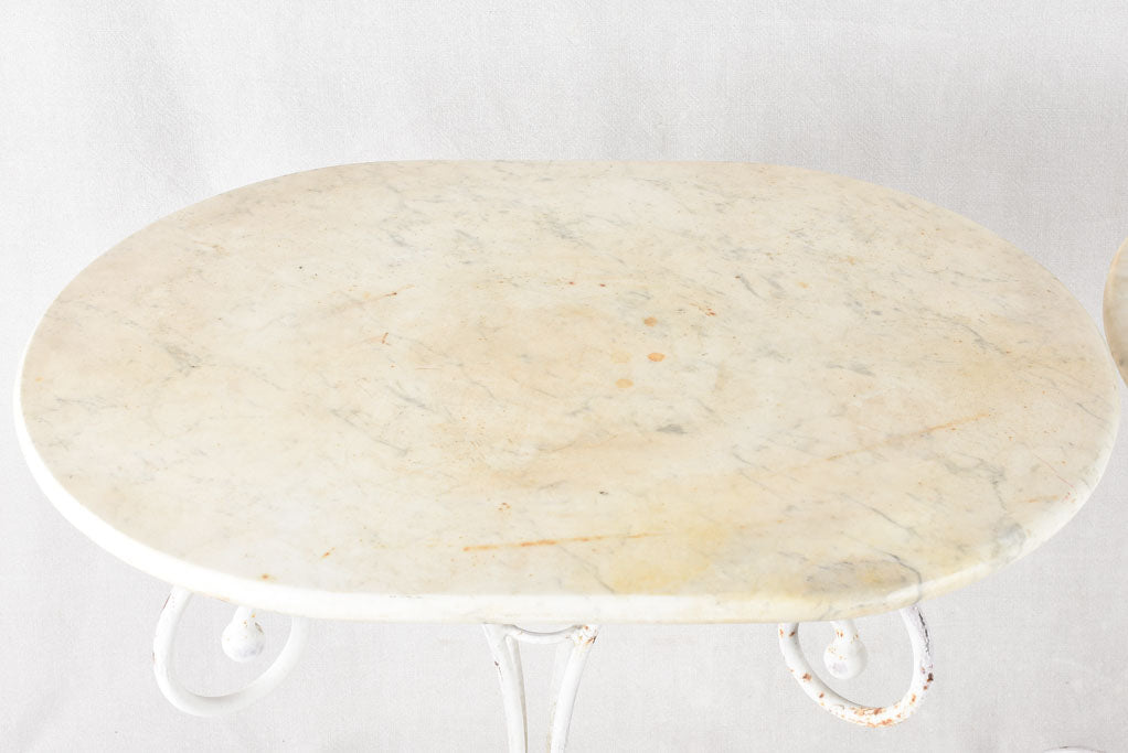 Pair of superb oval marble top garden tables