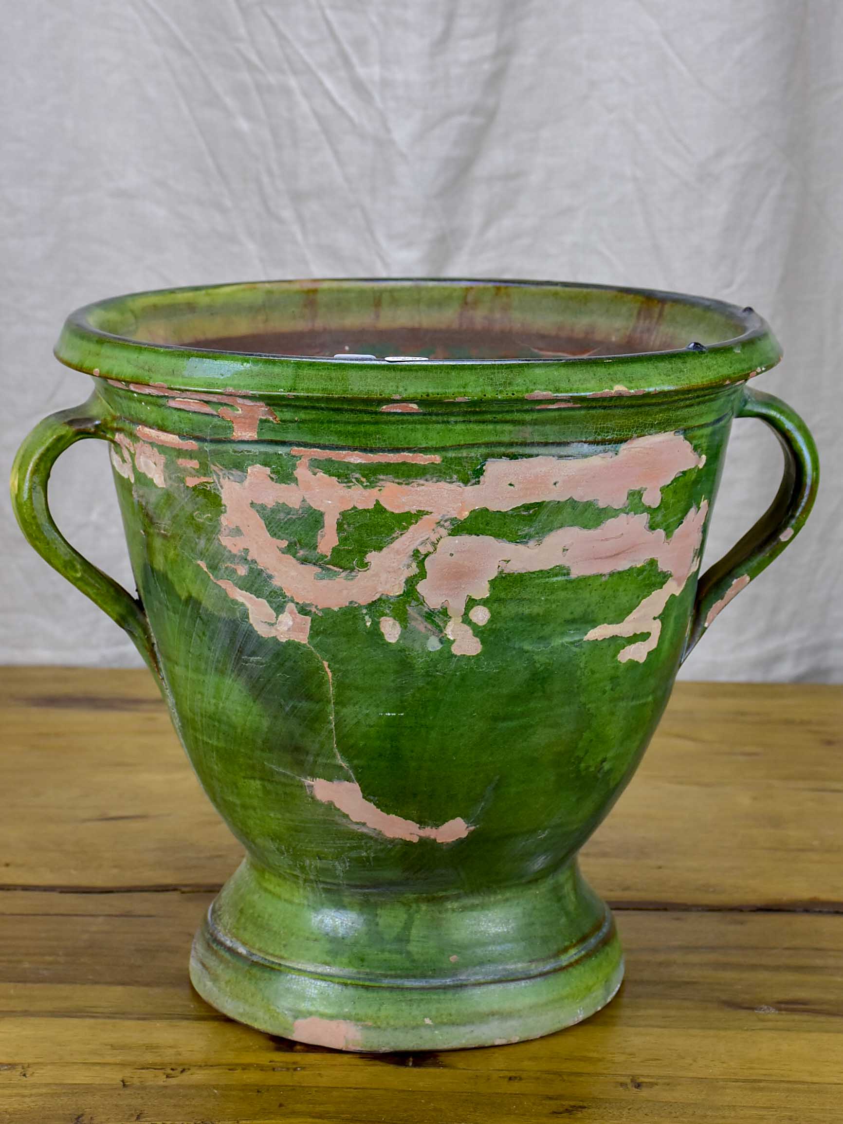 Antique French garden planter with green glaze and handles