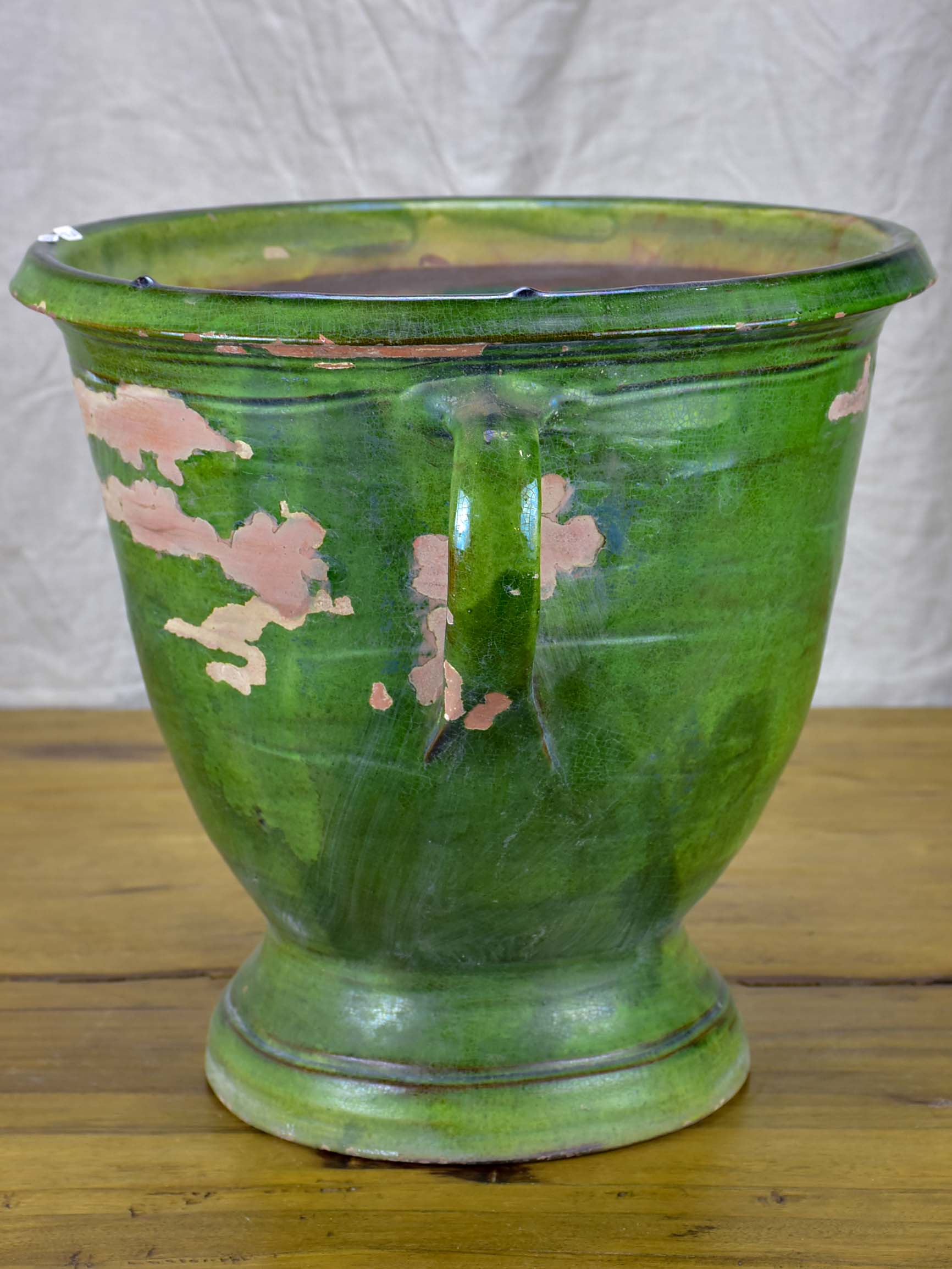 Antique French garden planter with green glaze and handles