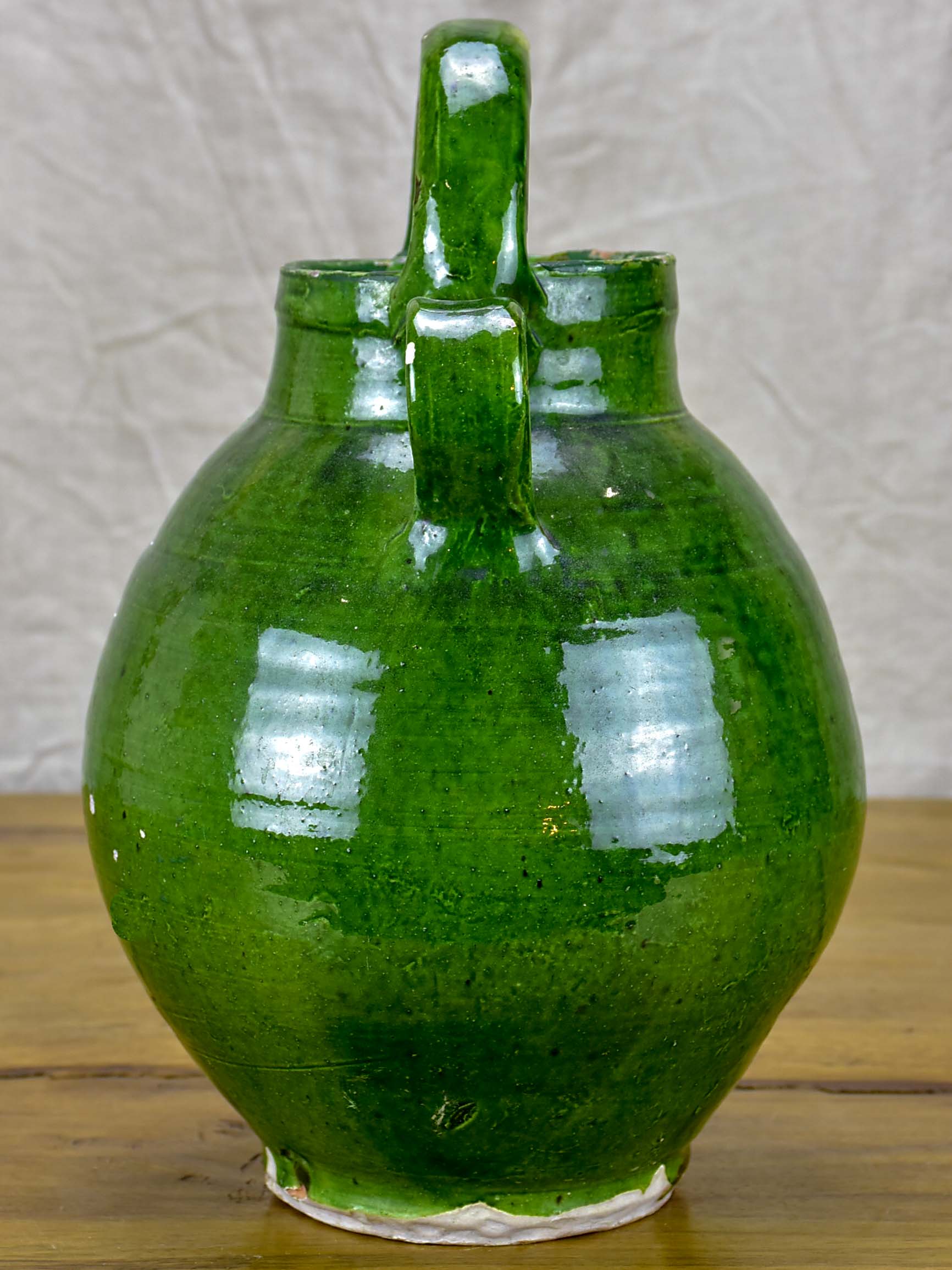 Early 20th Century French water jug with green glaze