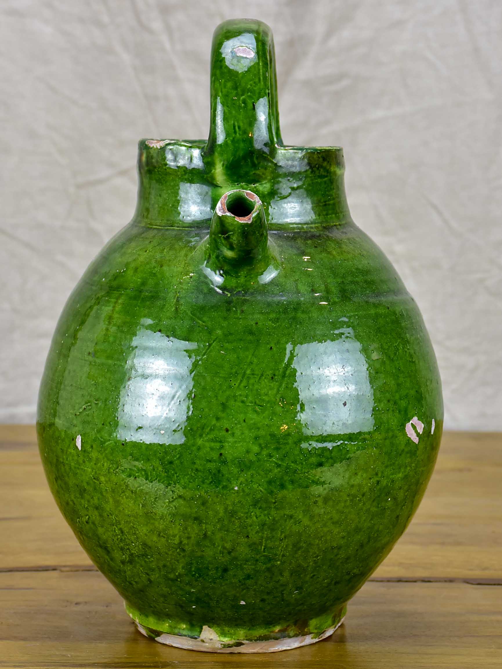 Early 20th Century French water jug with green glaze