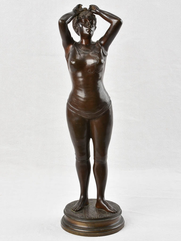 Striking art deco bronze lady statue