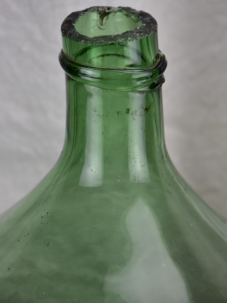 Large antique French demijohn - green