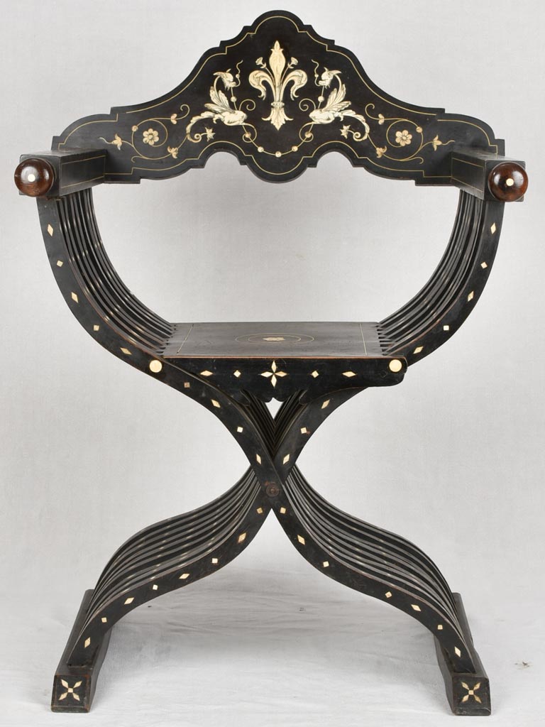 Ebony curule armchair with bone inlay